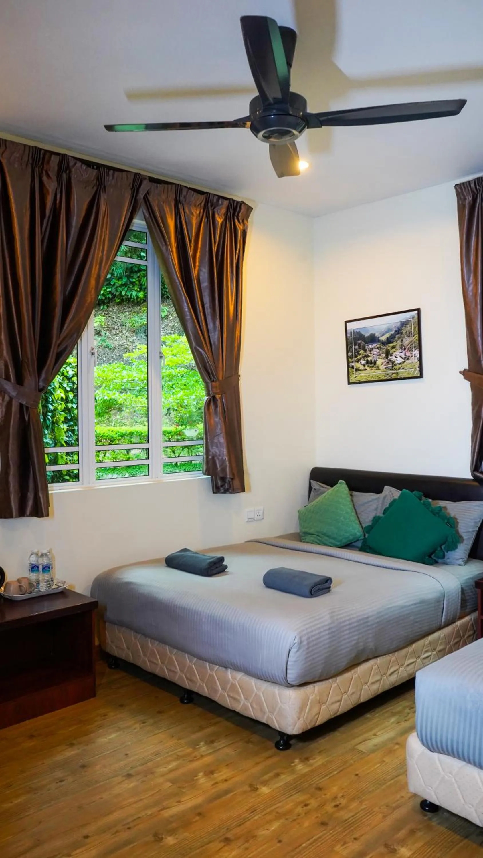 Bed in Highlanders Garden Guesthouse at Arundina Cameron Highlands