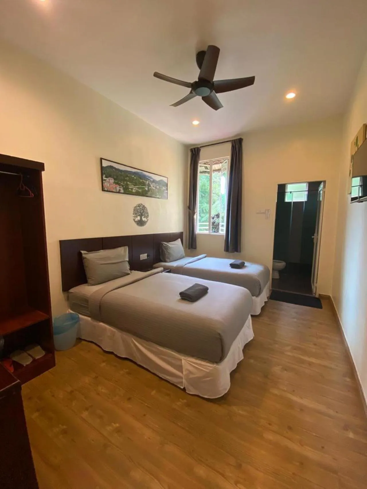 Bed in Highlanders Garden Guesthouse at Arundina Cameron Highlands