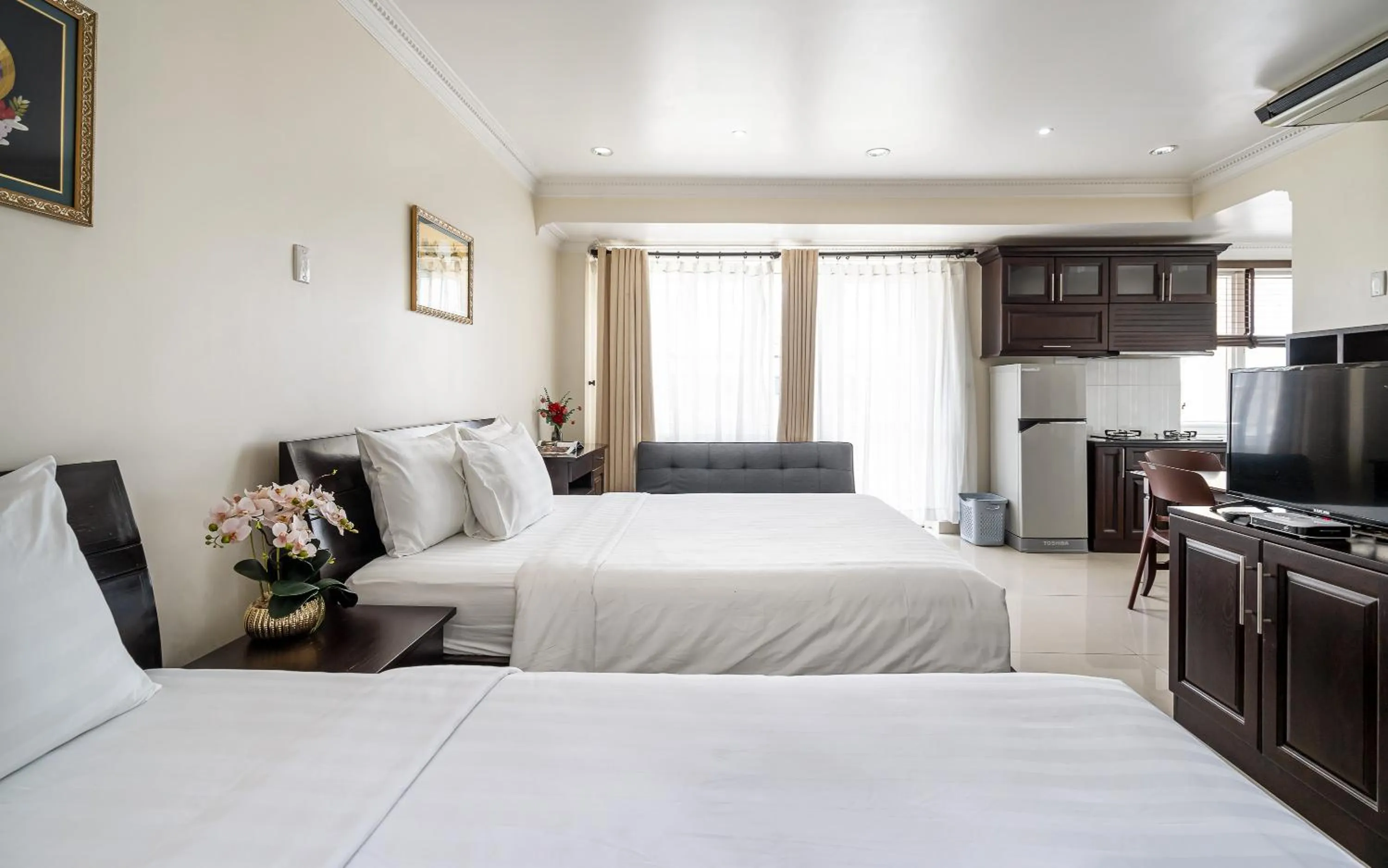 Bed in La Bonita Hotel and Apartments