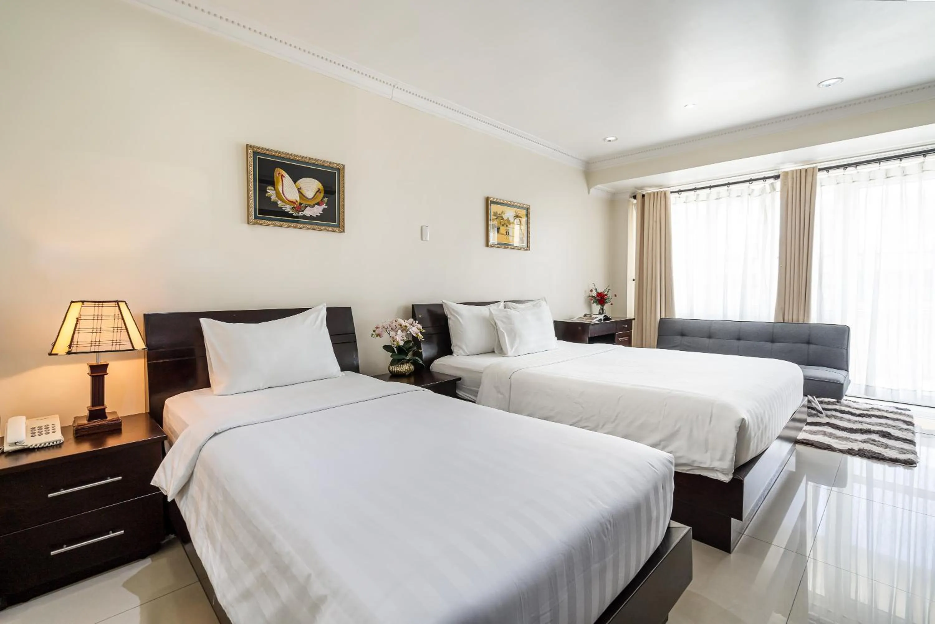 Bed in La Bonita Hotel and Apartments