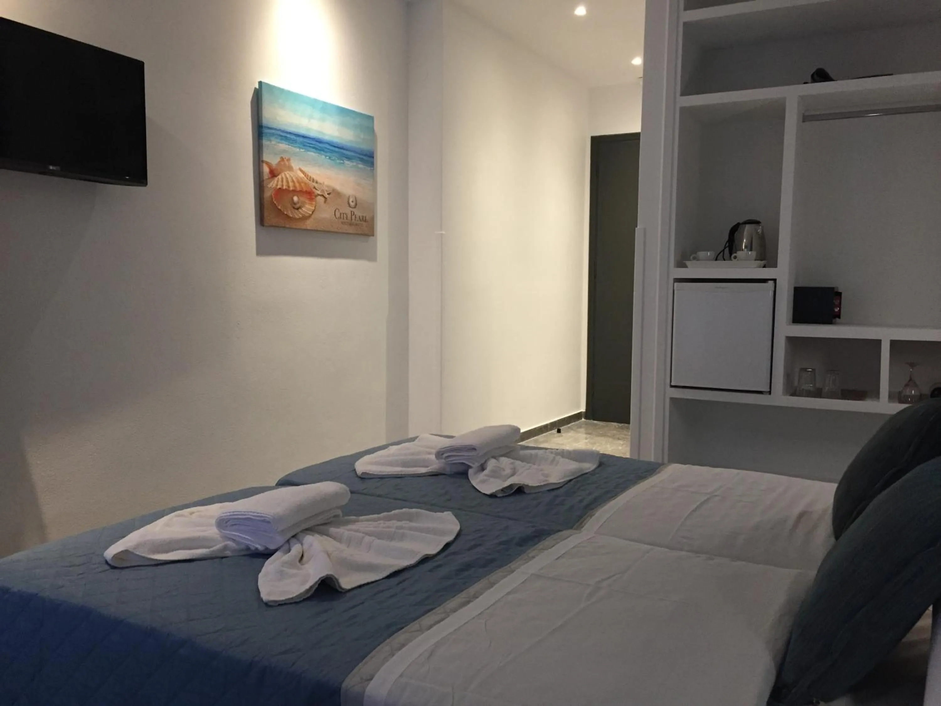 Photo of the whole room, Bed in City Pearl Hotel