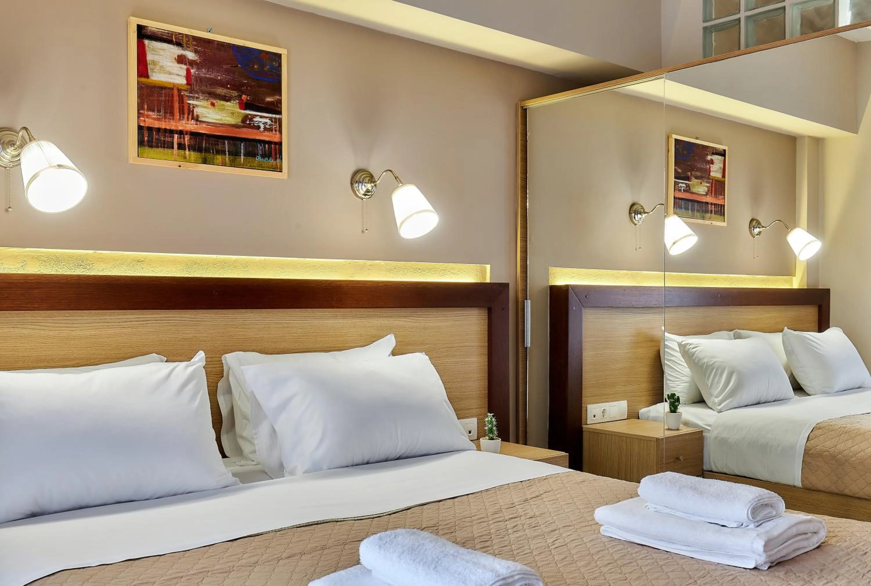 Bed in Dorian Boutique Hotel-Apartments