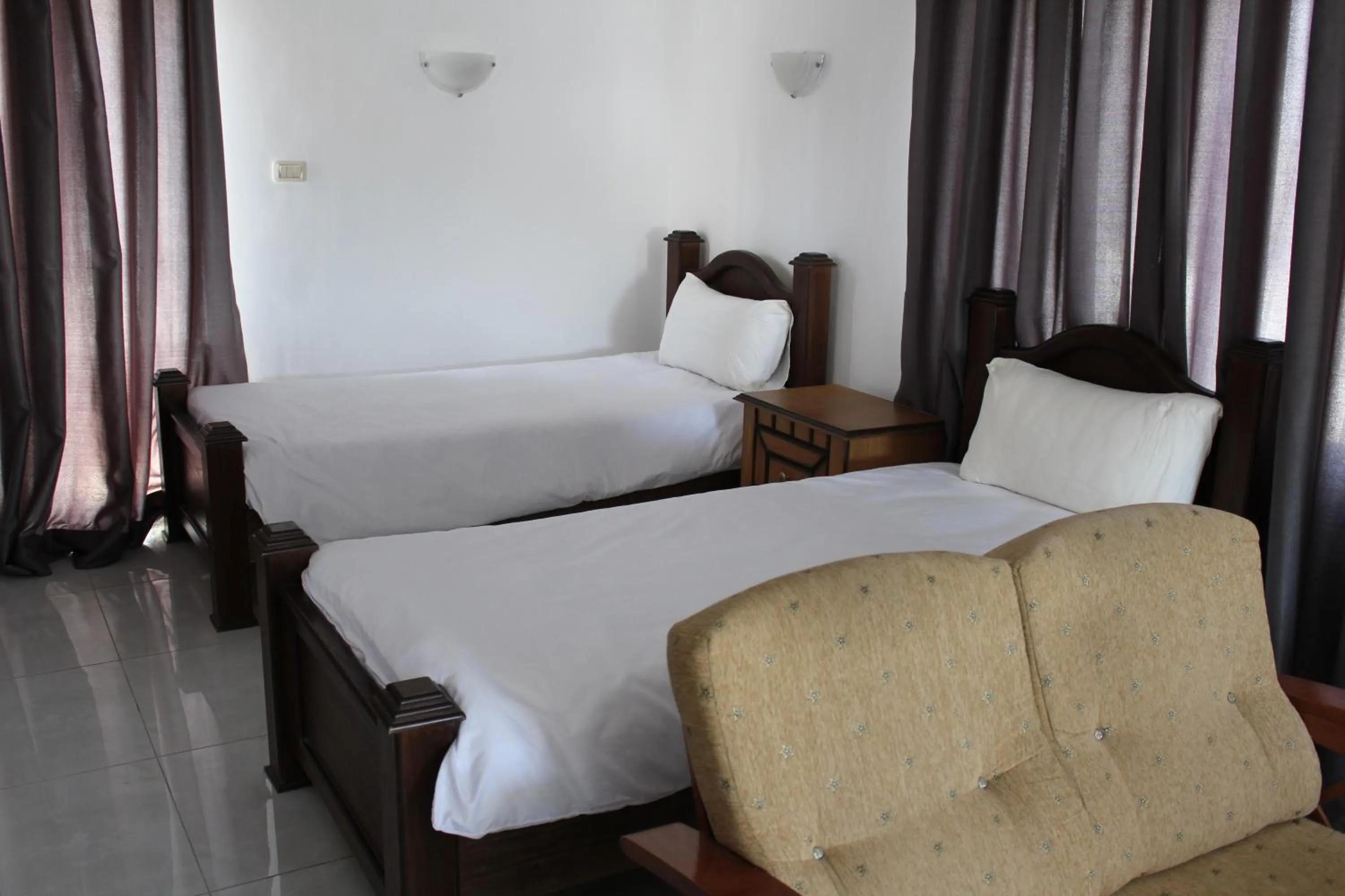 Bed in The Place Apartments