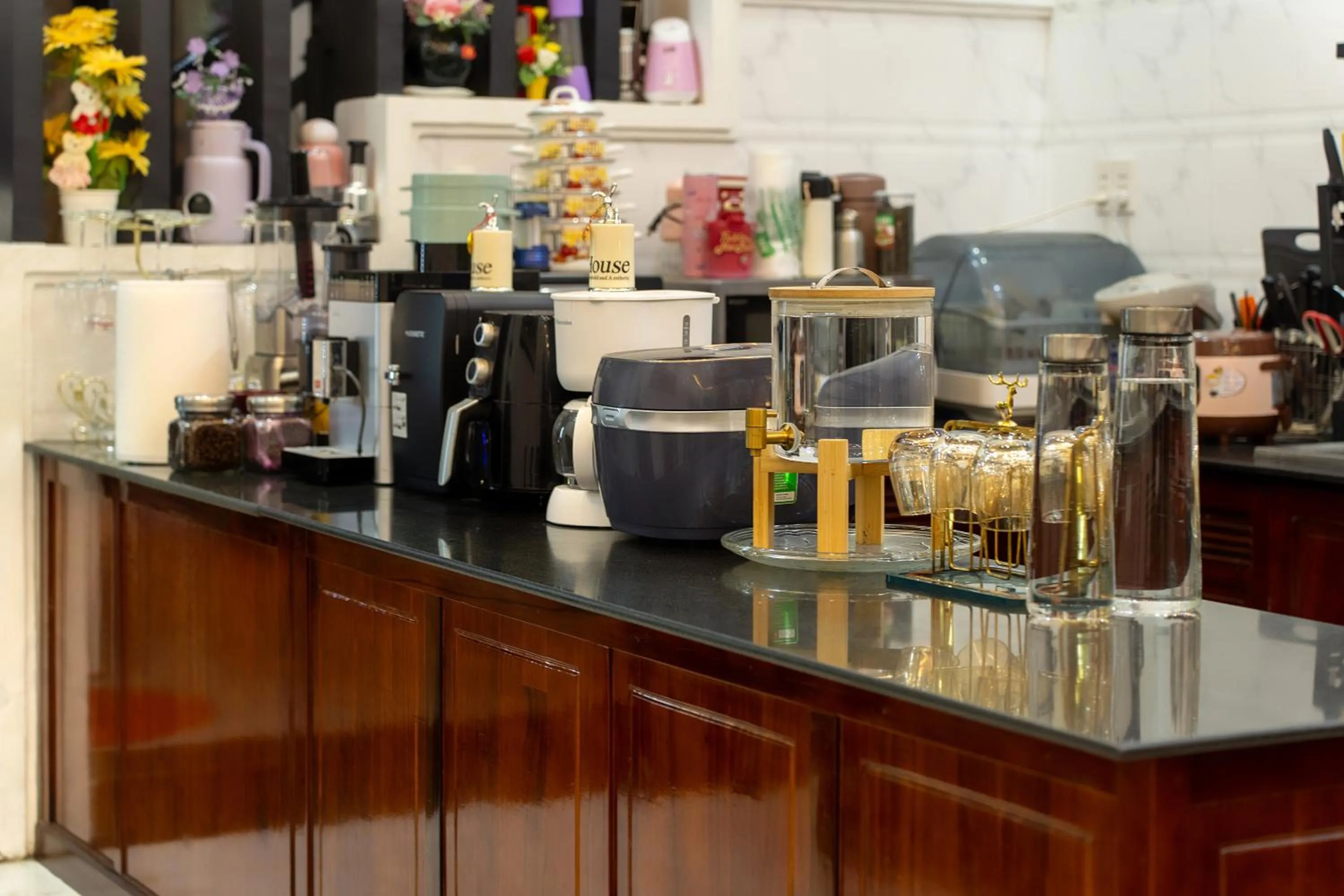 Kitchen or kitchenette in Golden Bell Homestay