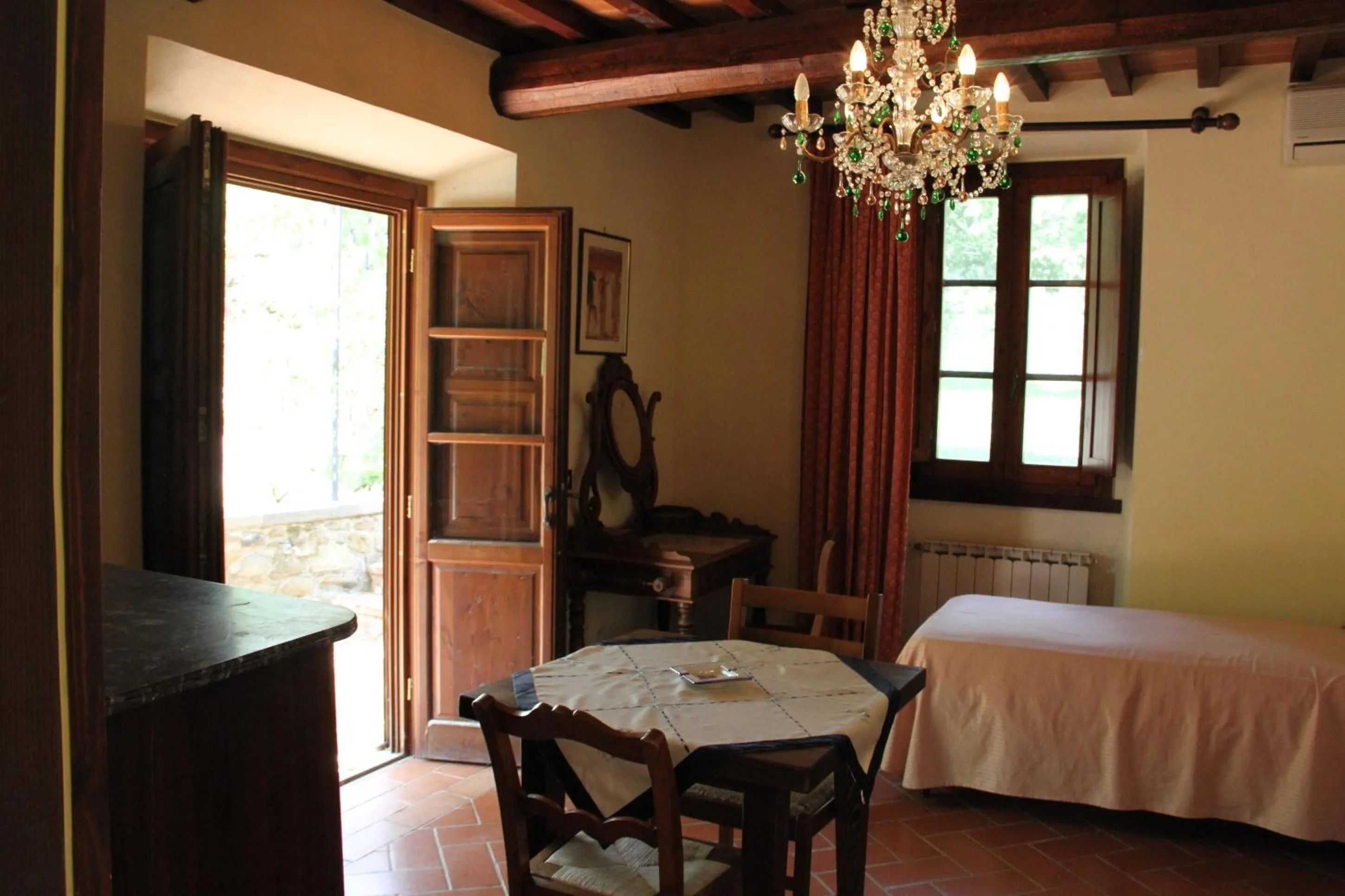 Seating area, Bed in Villa Rigacci