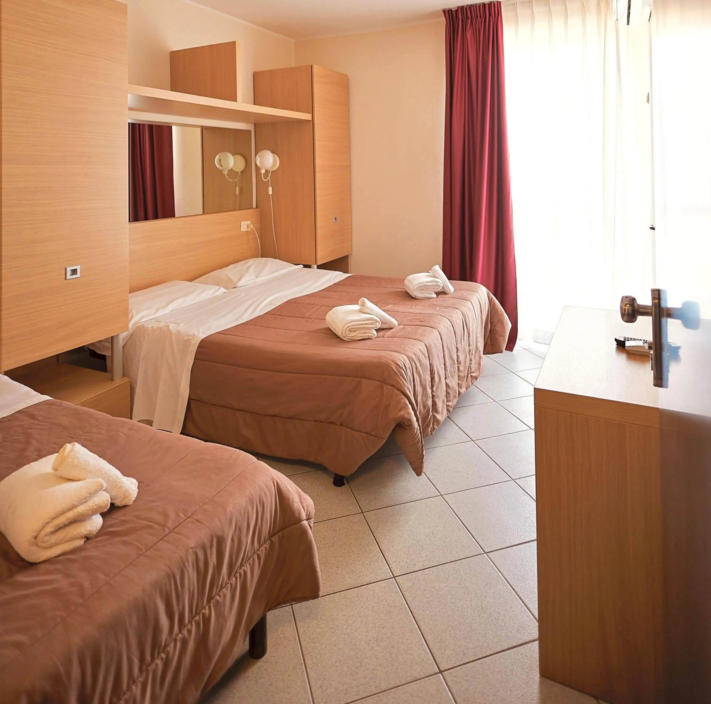 Bed in Hotel Felicioni