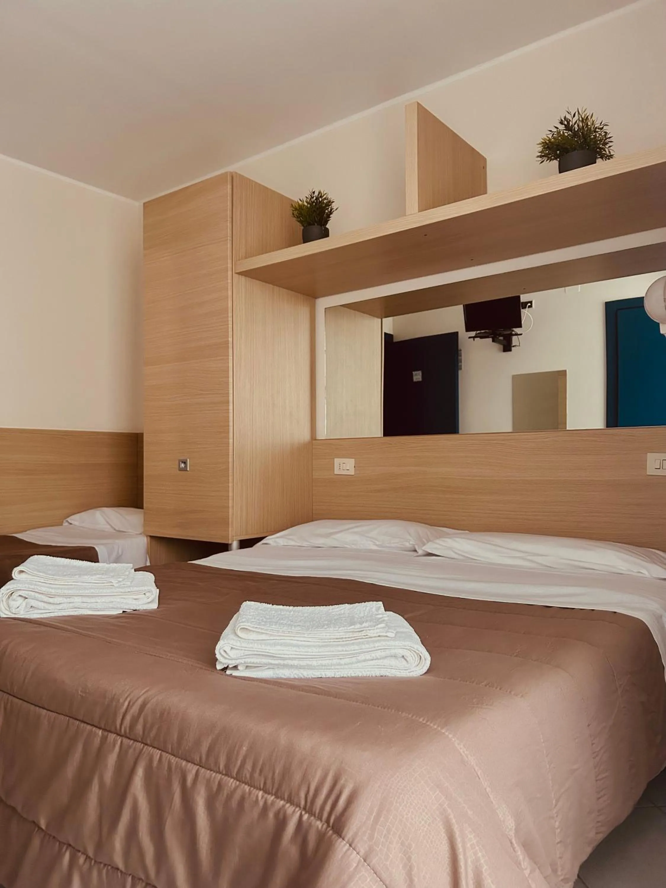 Bed in Hotel Felicioni