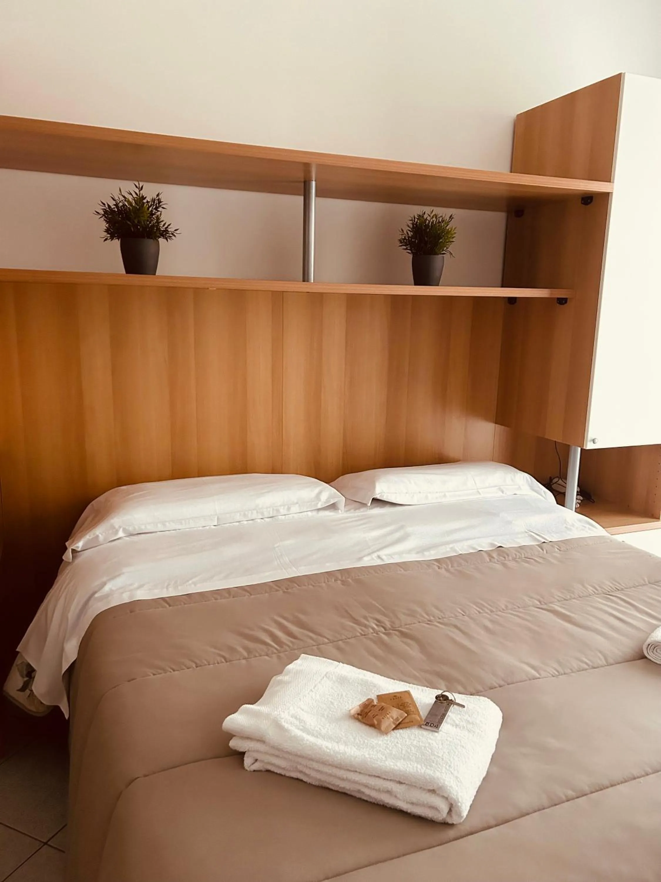 Bed in Hotel Felicioni