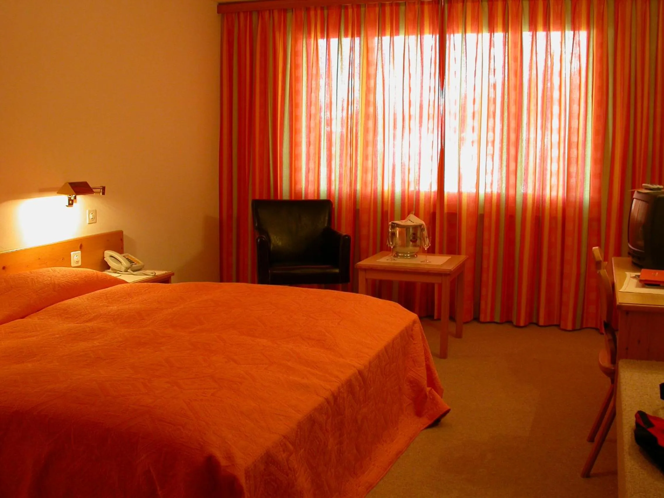 Bed in Hotel Pöstli