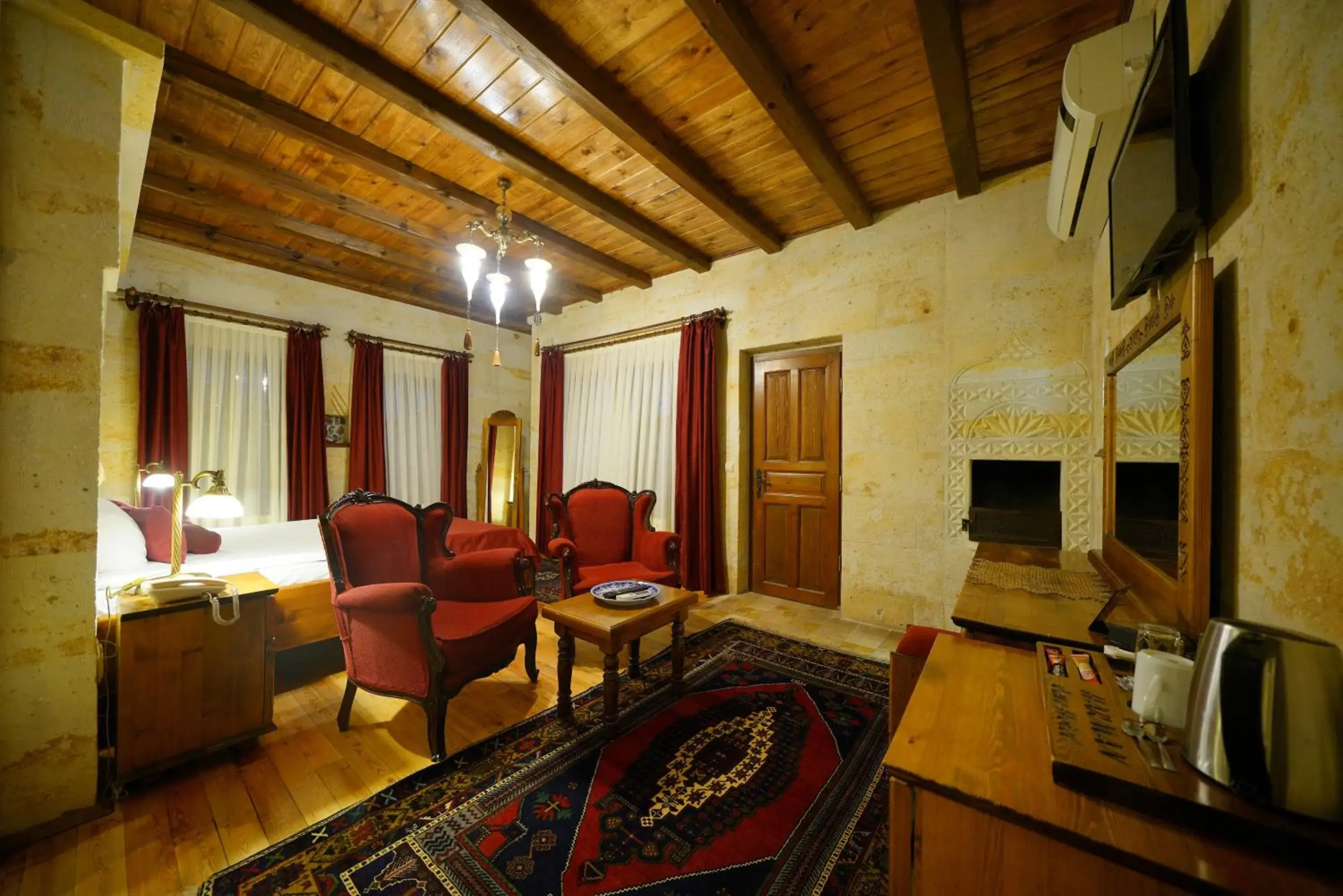 Deluxe Stone Room with Balcony in Harman Cave Hotel Deluxe Stone Room with Balcony in Harman Cave Hotel