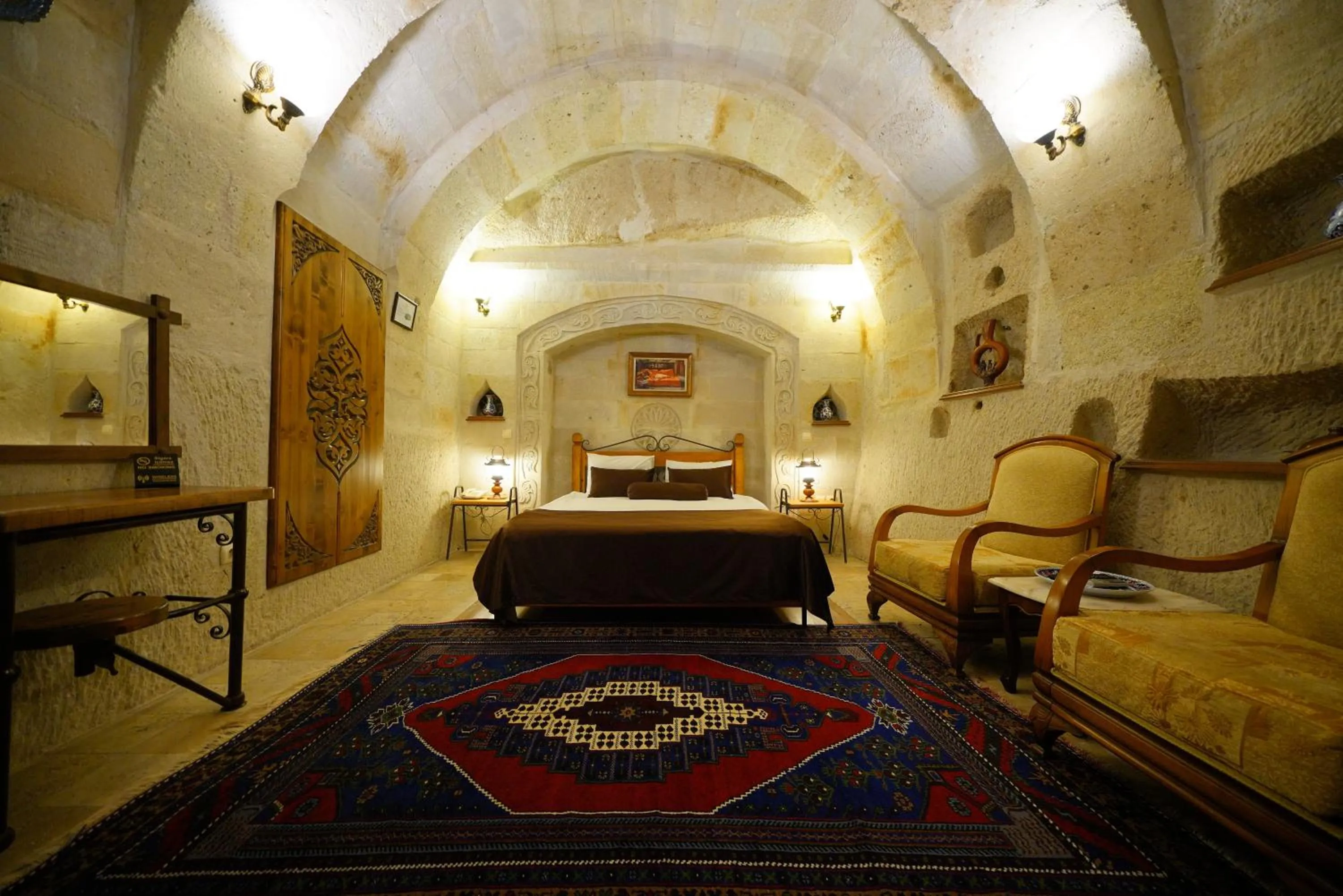 Bed in Harman Cave Hotel