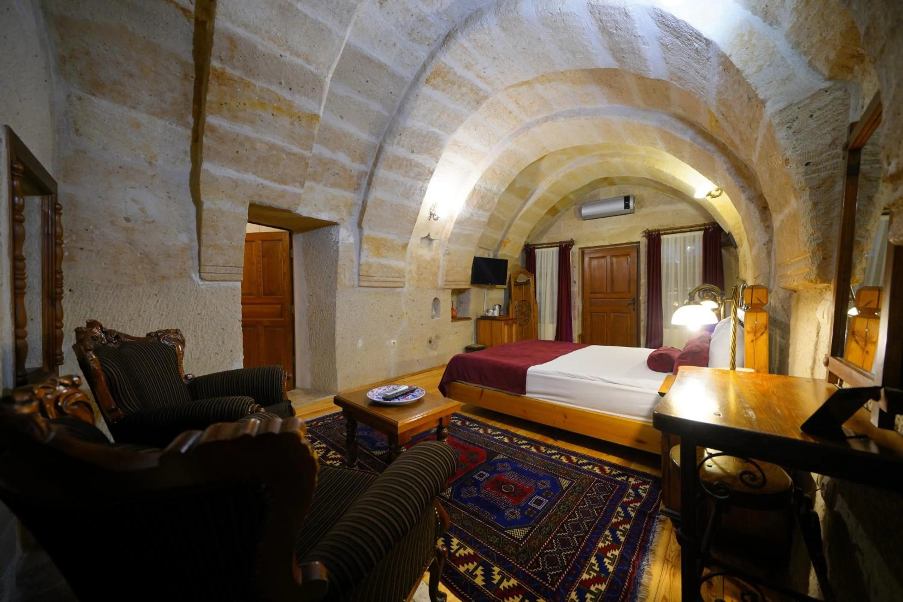 Bed in Harman Cave Hotel