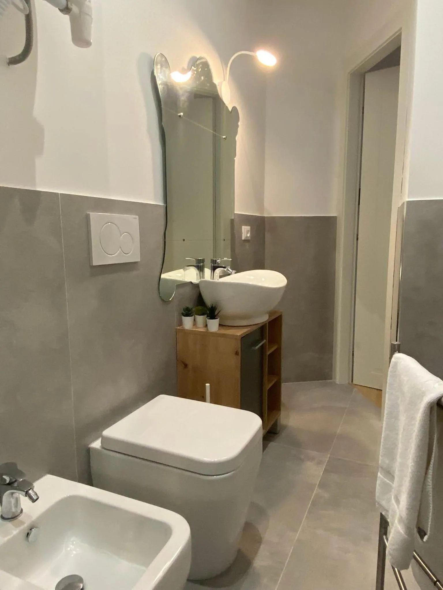 Bathroom in Happy Family Apartments Lavagna