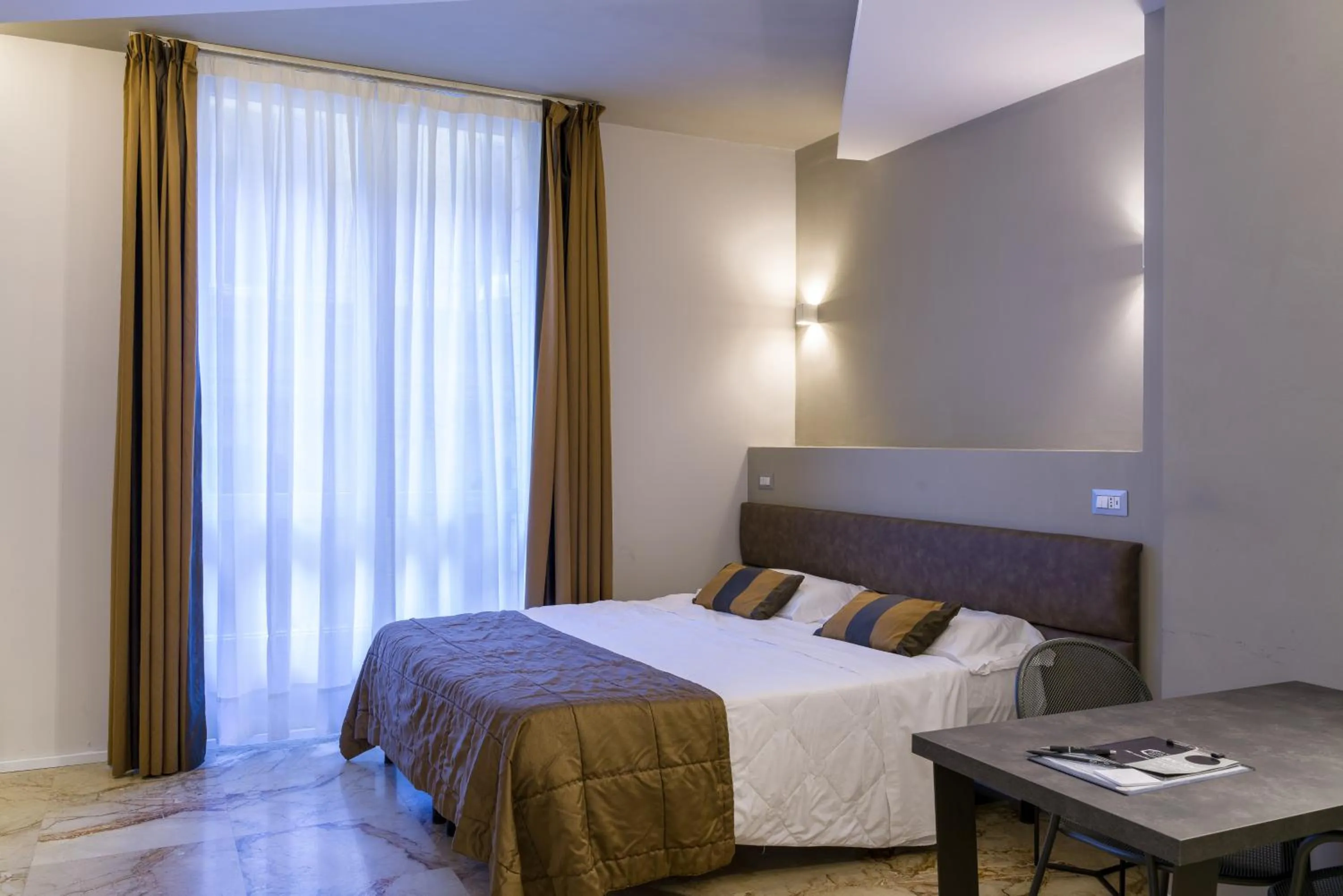 Bed in Appartamenti Astoria