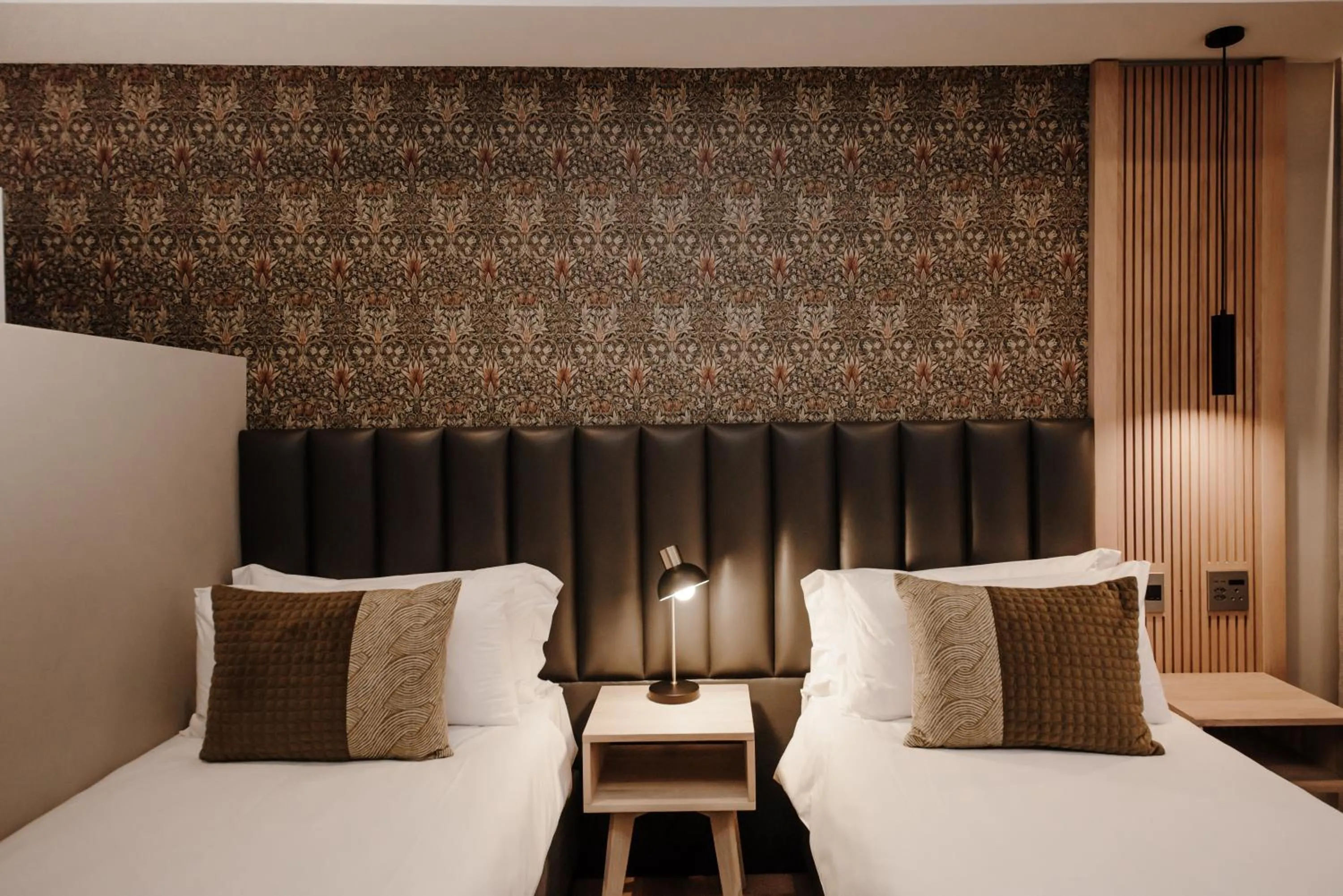 Bed in The Hawthorn Boutique Hotel