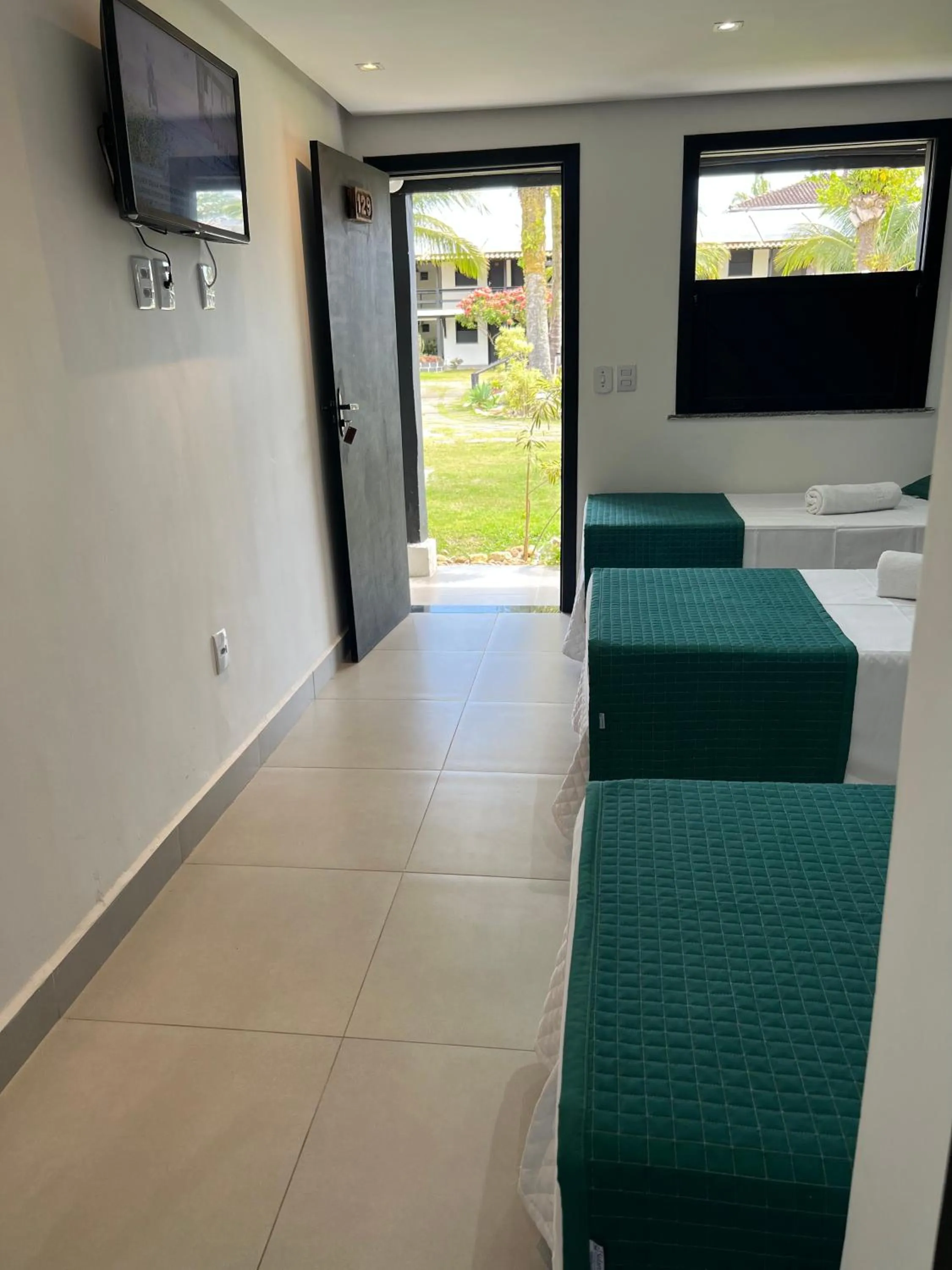 Photo of the whole room, Bed in BEIRA MAR PRAIA HOTEL - ORLA - Praia de Taperapuan