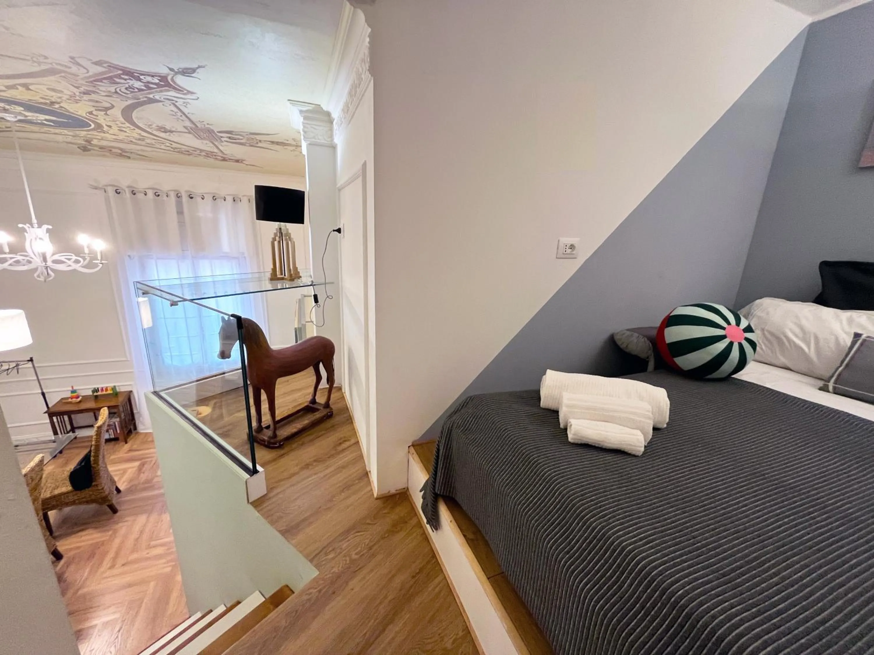 Bed in Happy Family Apartments Cairoli Studio