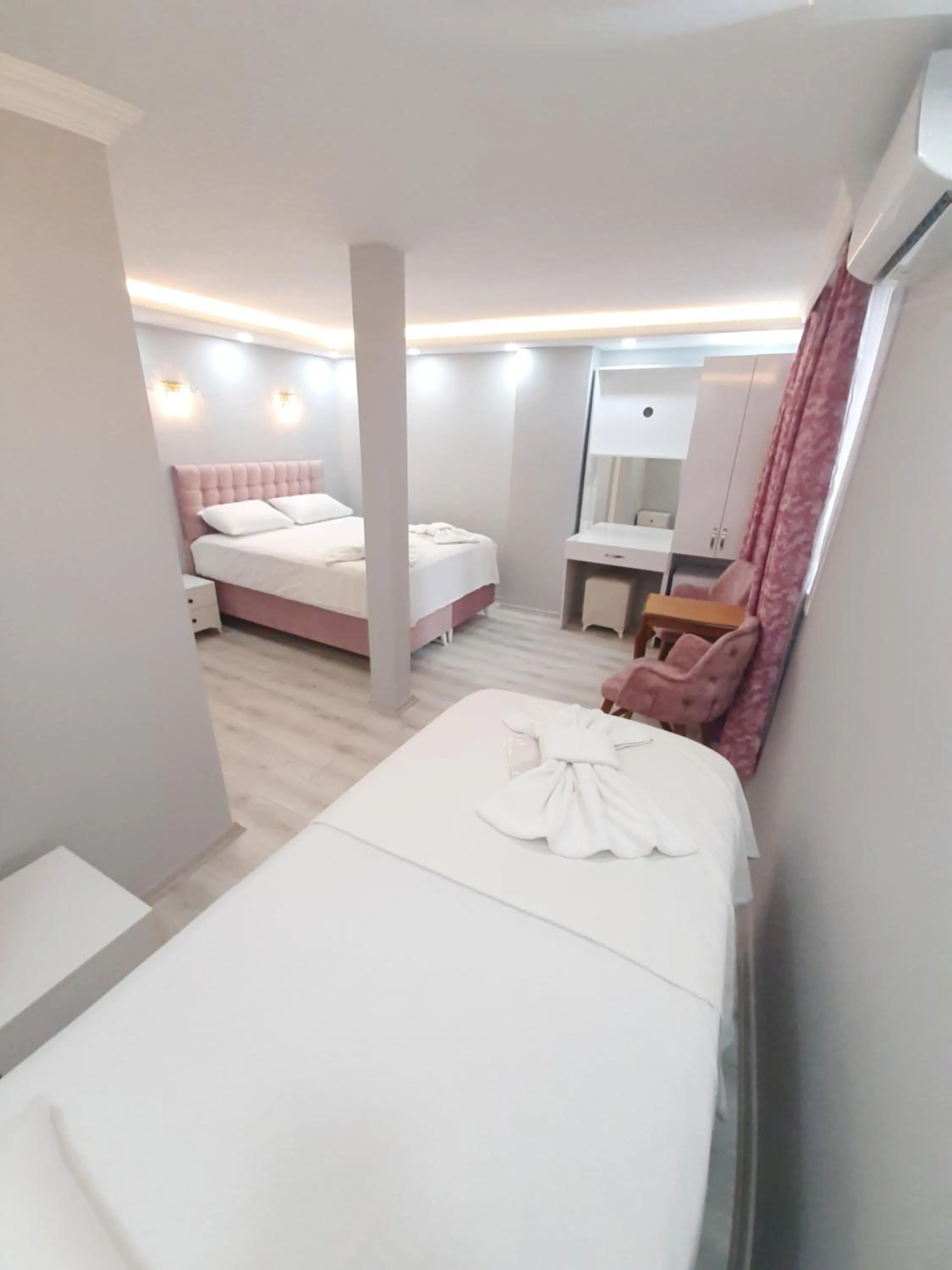 Bed in VERSECA HOTEL