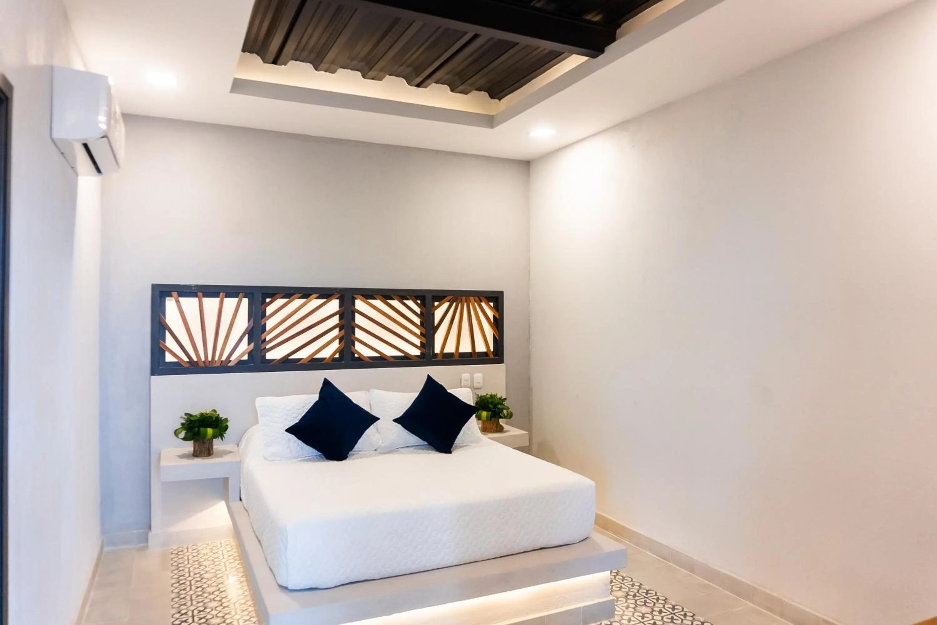 Bed in The Garden Suites