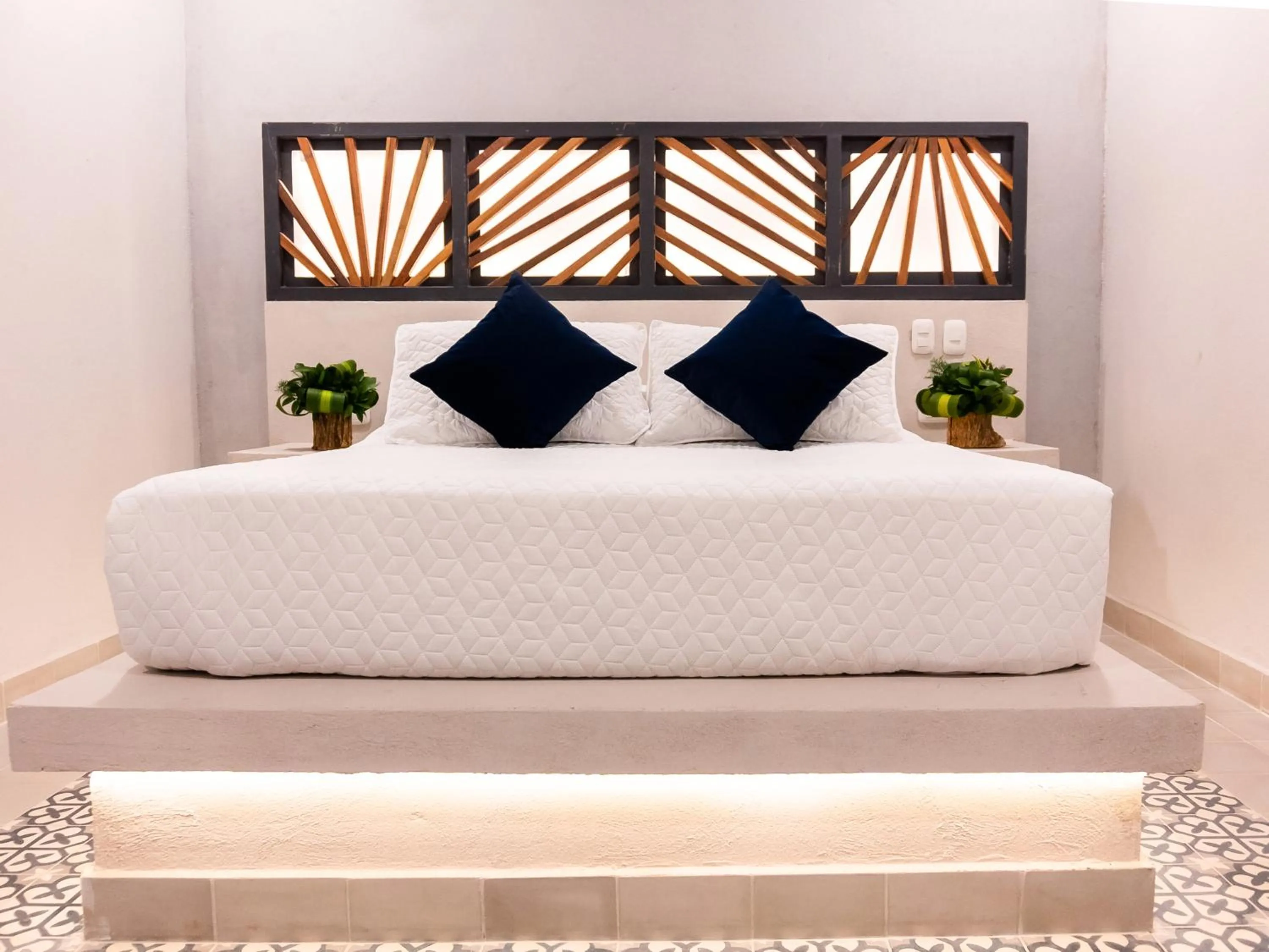 Bed in The Garden Suites