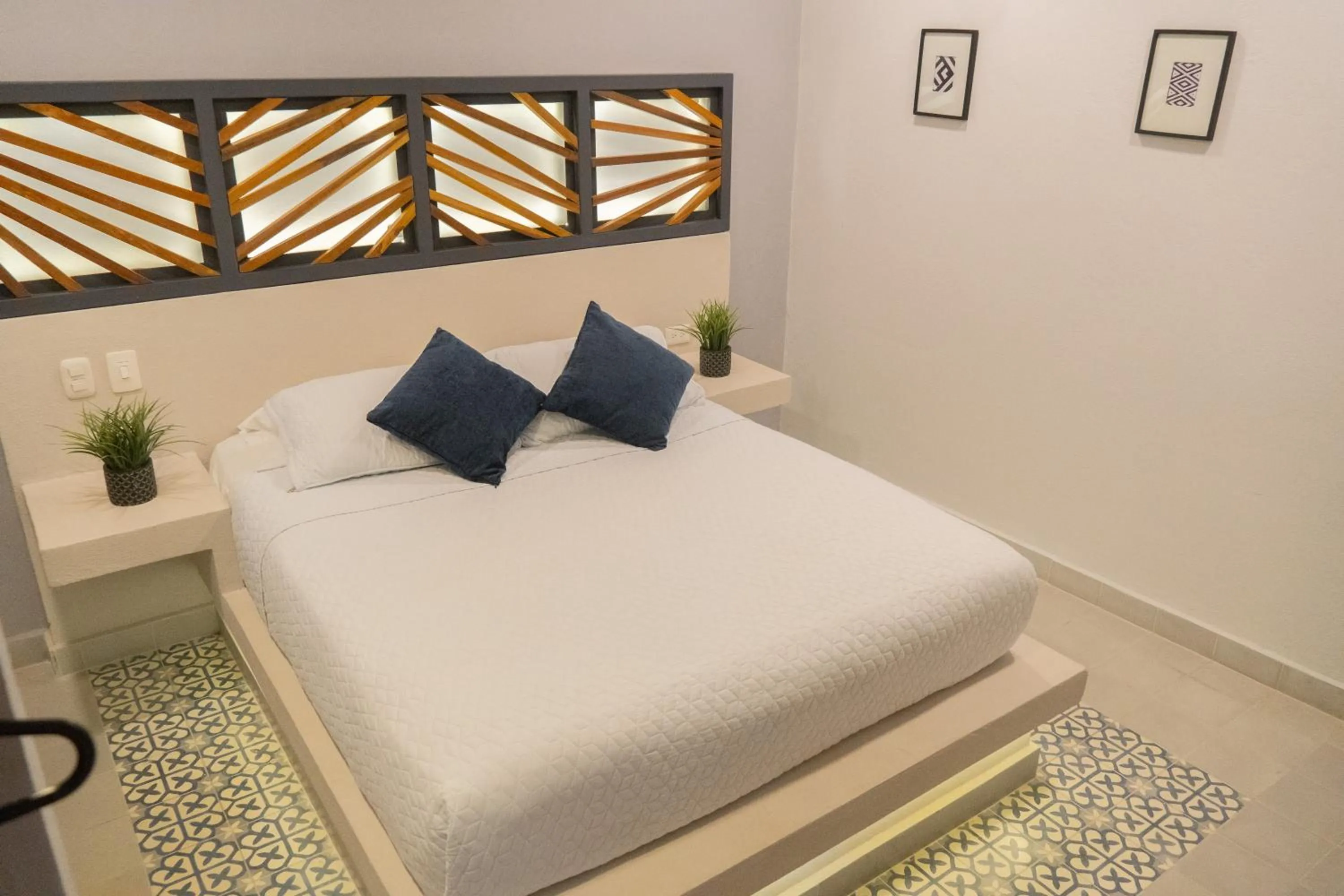 Bed in The Garden Suites