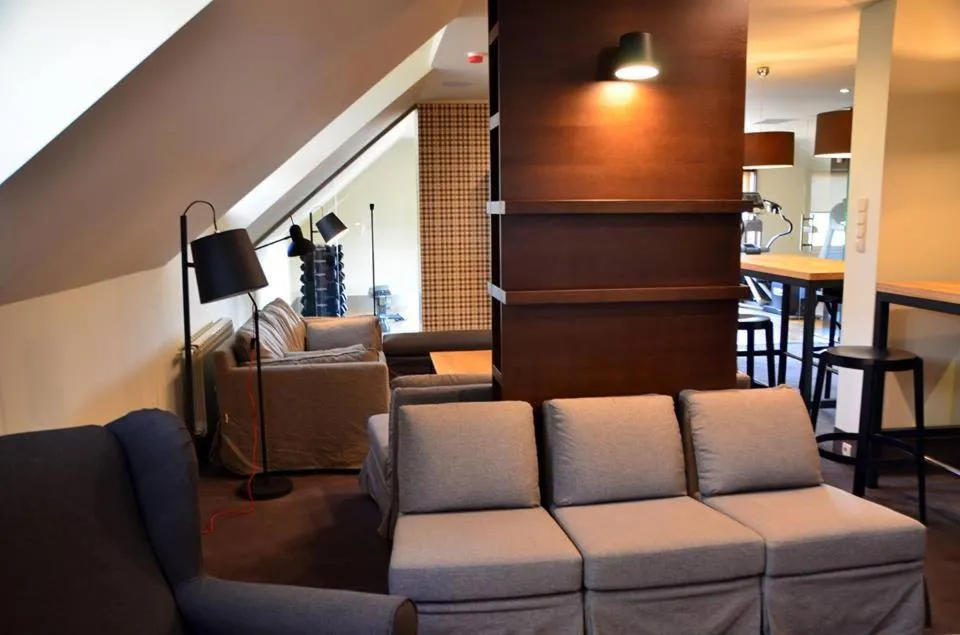 Communal lounge/ TV room, Seating Area in Hotel Wawrzyniak