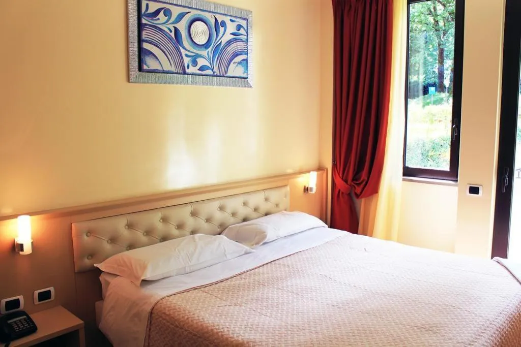 Bedroom in Relais Sans Soucis & Spa