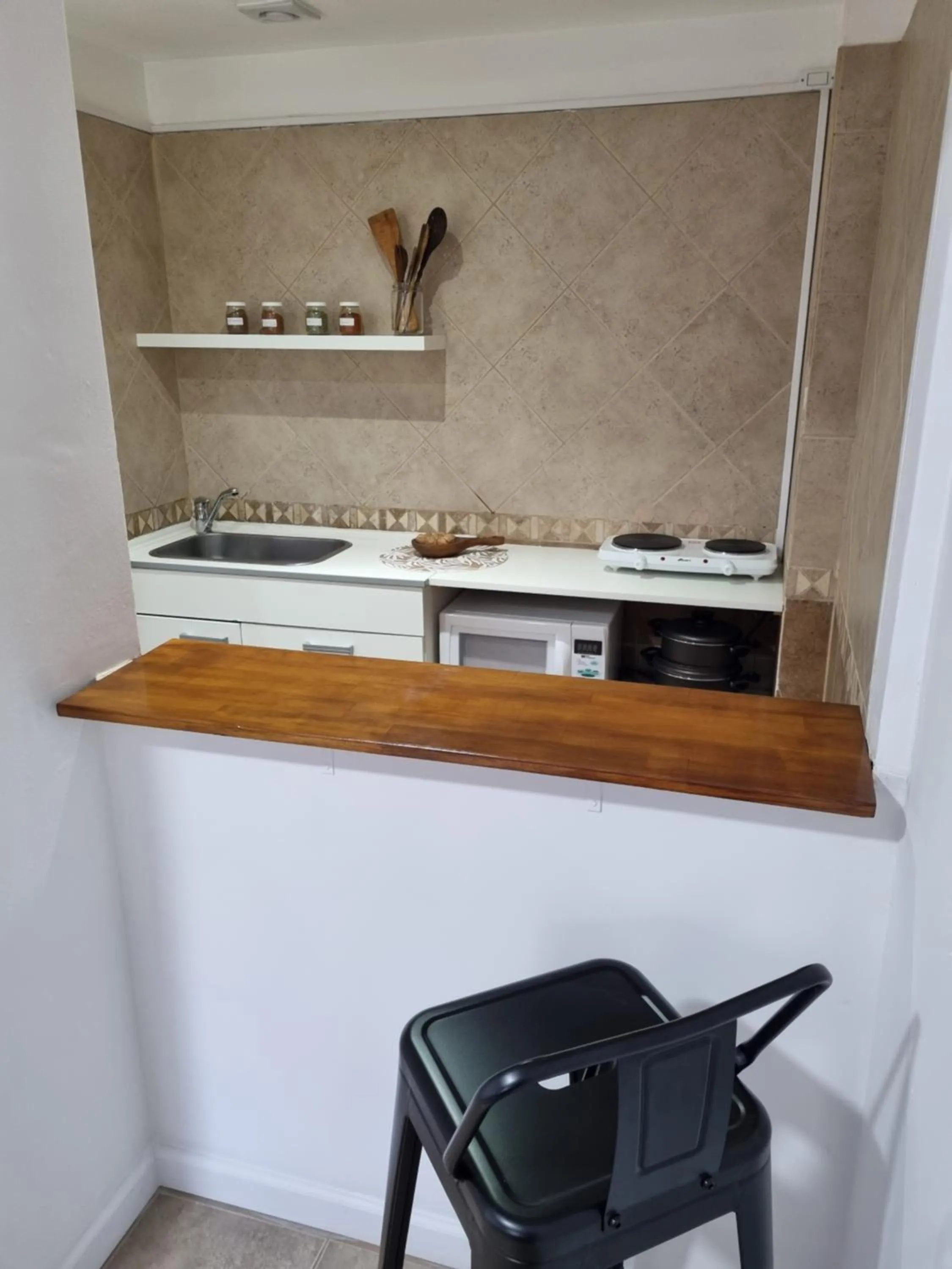 Kitchen or kitchenette in Isla Bonita Suites