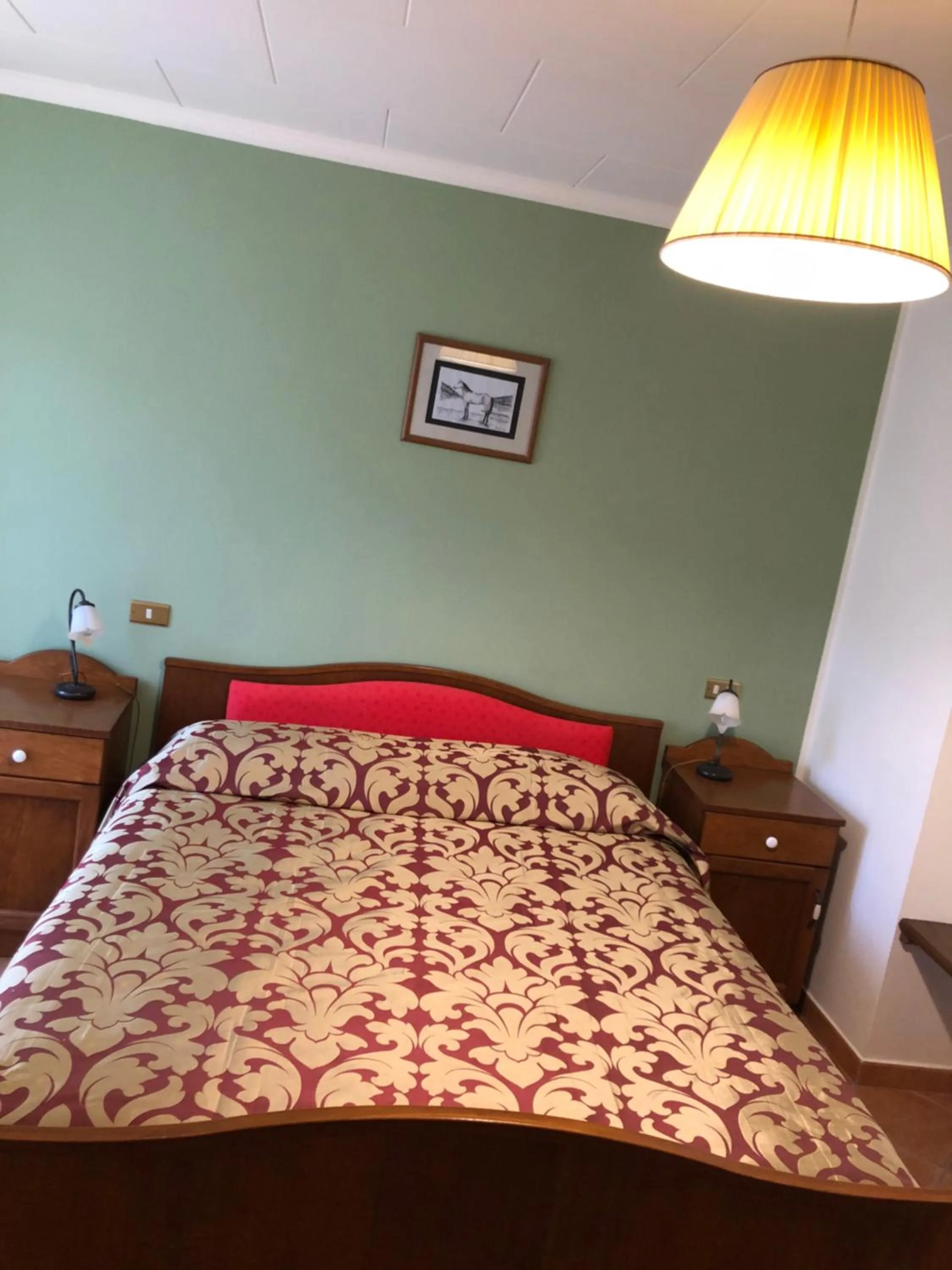 Bed in Albergo Miramonti