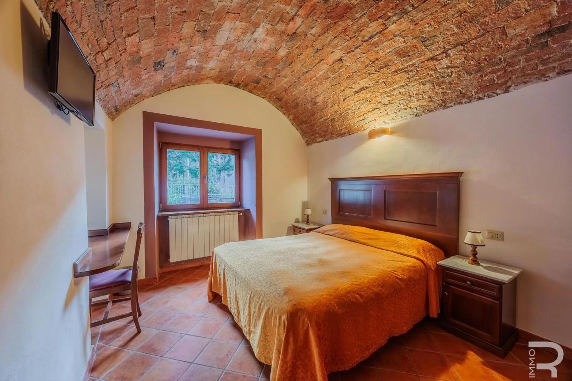 Bed in Albergo Miramonti