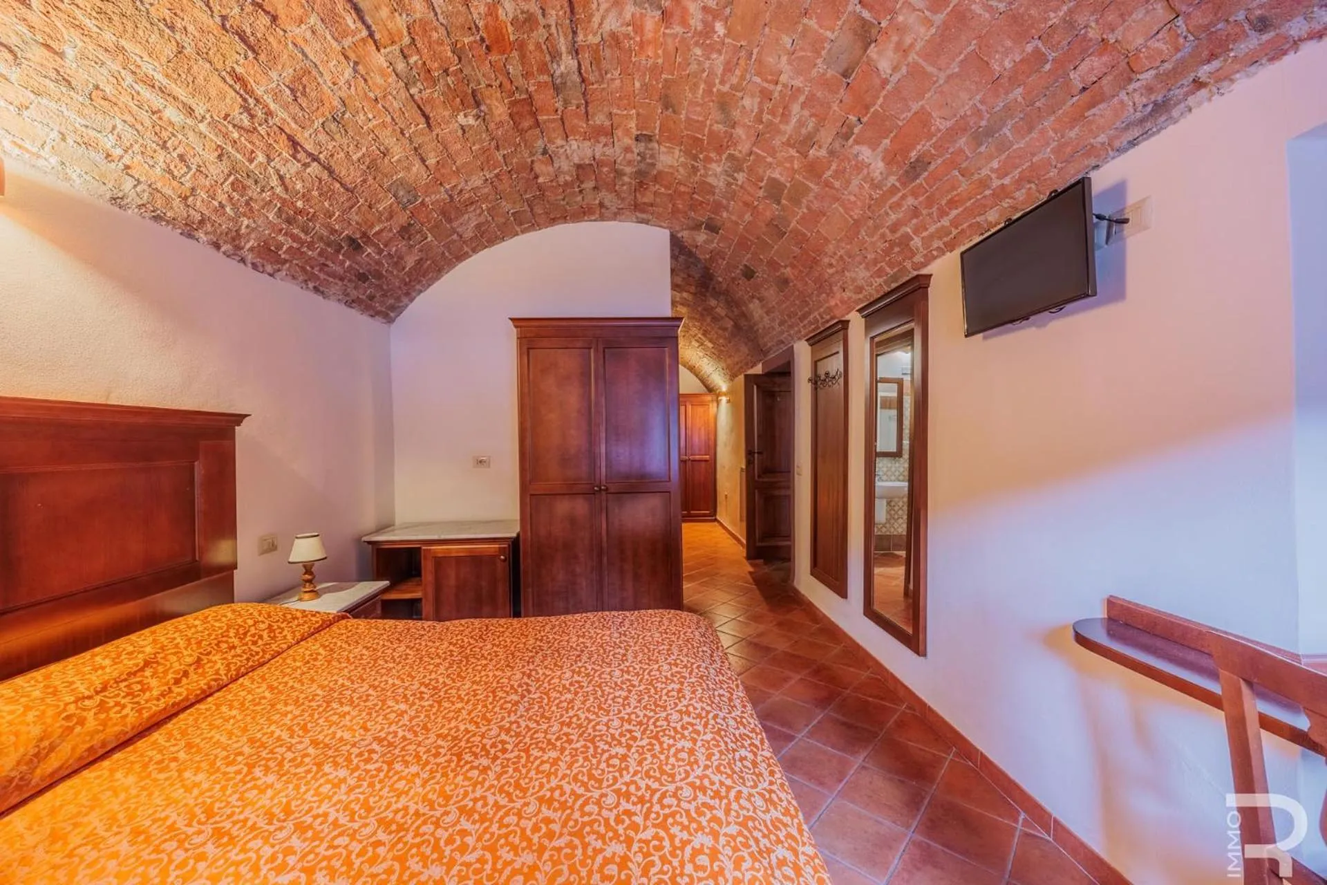 Bed in Albergo Miramonti