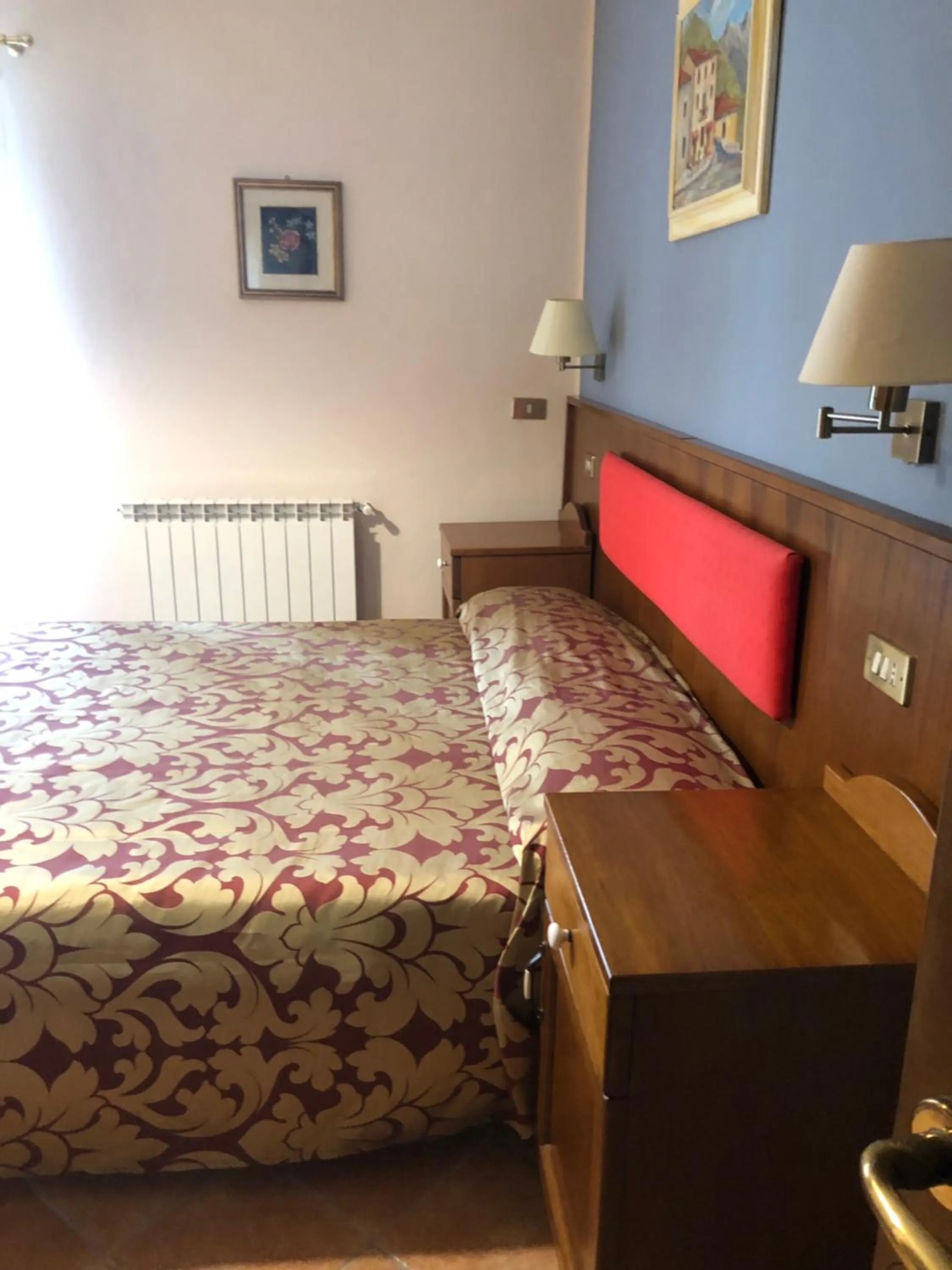 Bed in Albergo Miramonti