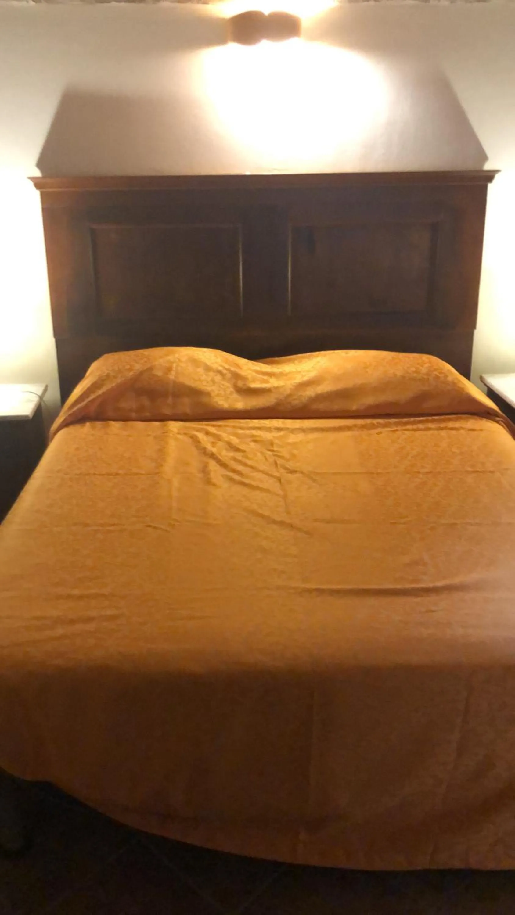 Bed in Albergo Miramonti