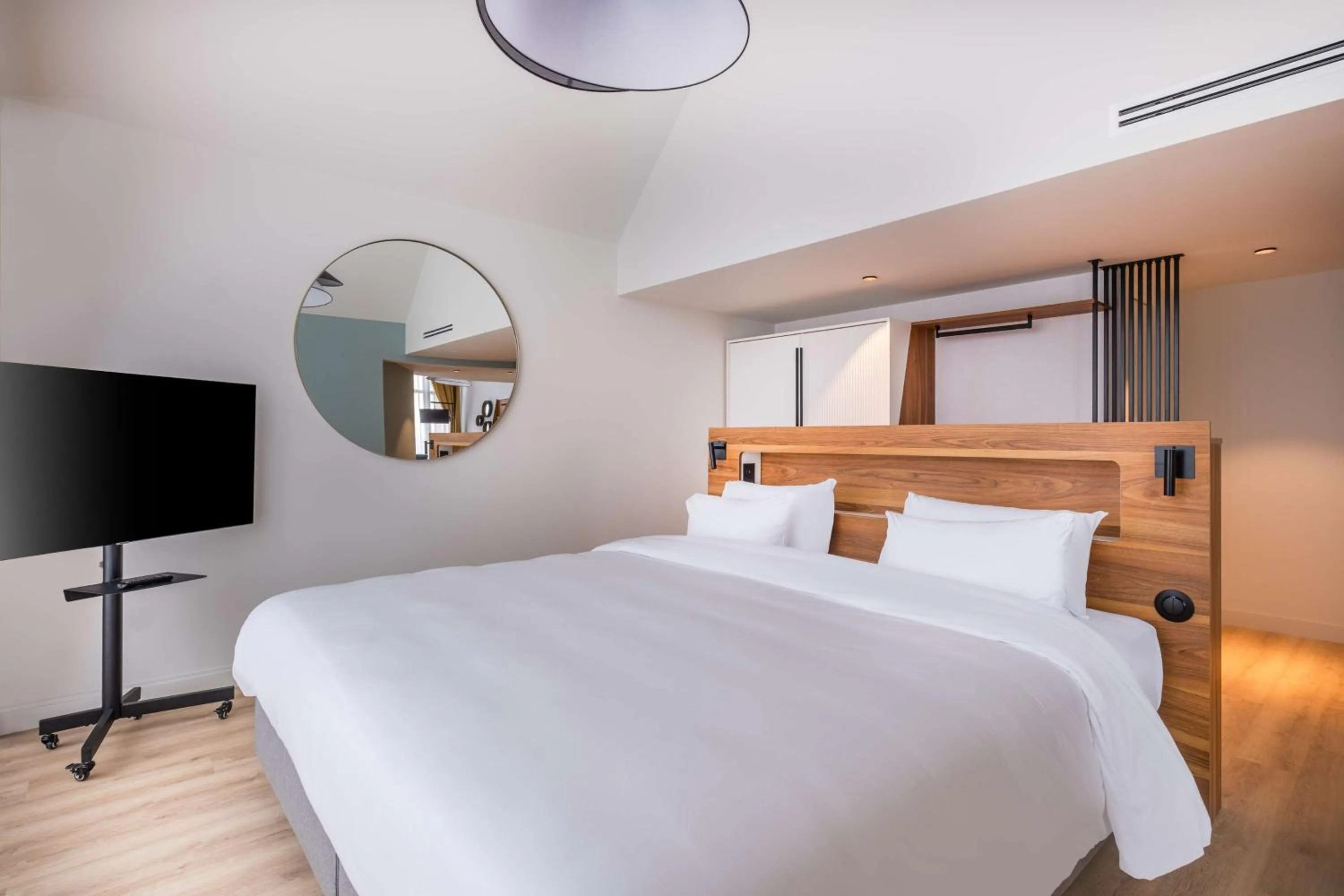 Photo of the whole room, Bed in Radisson Blu Grand Hotel & Spa, Malo-Les-Bains