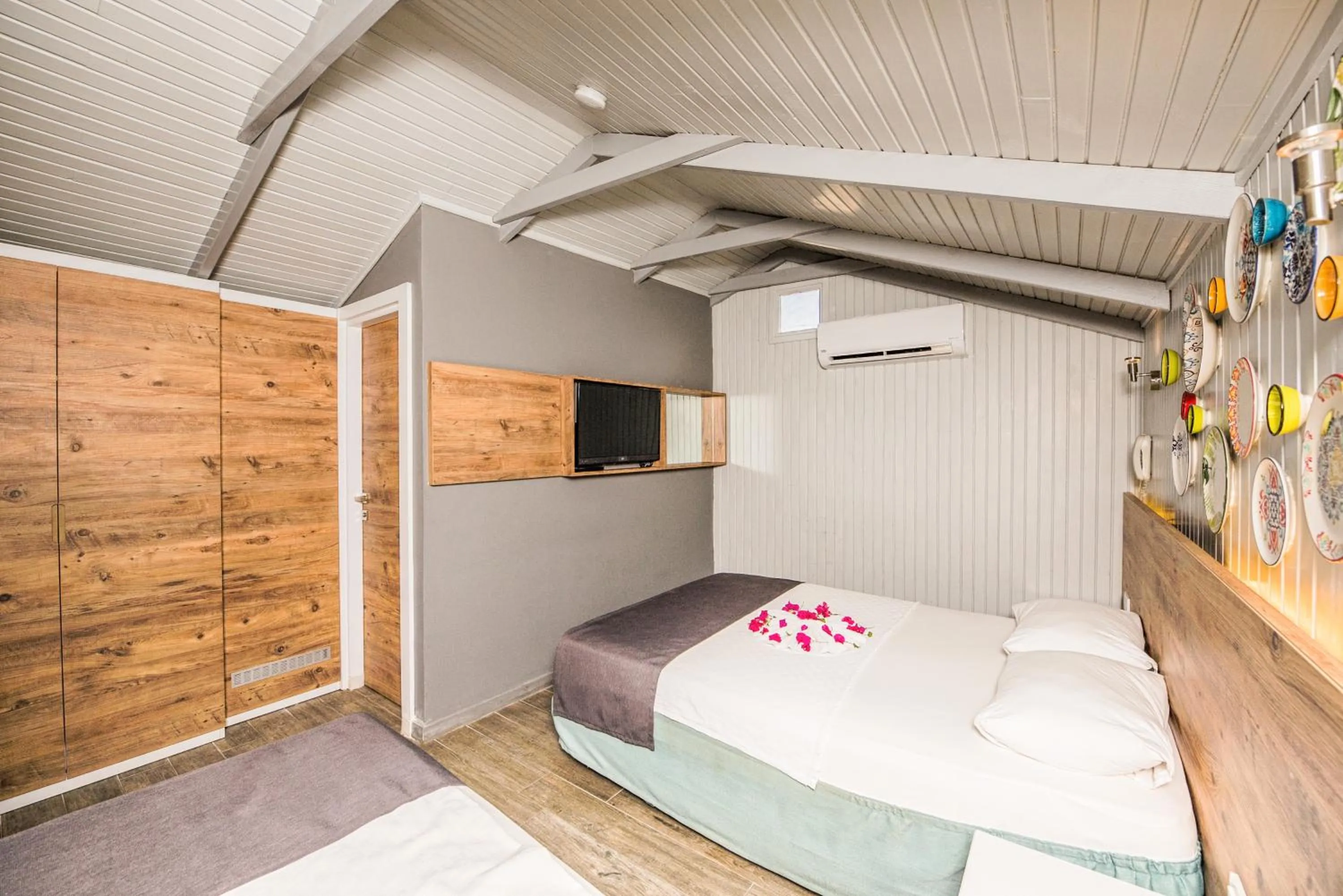 Bed in Leda Beach Hotel