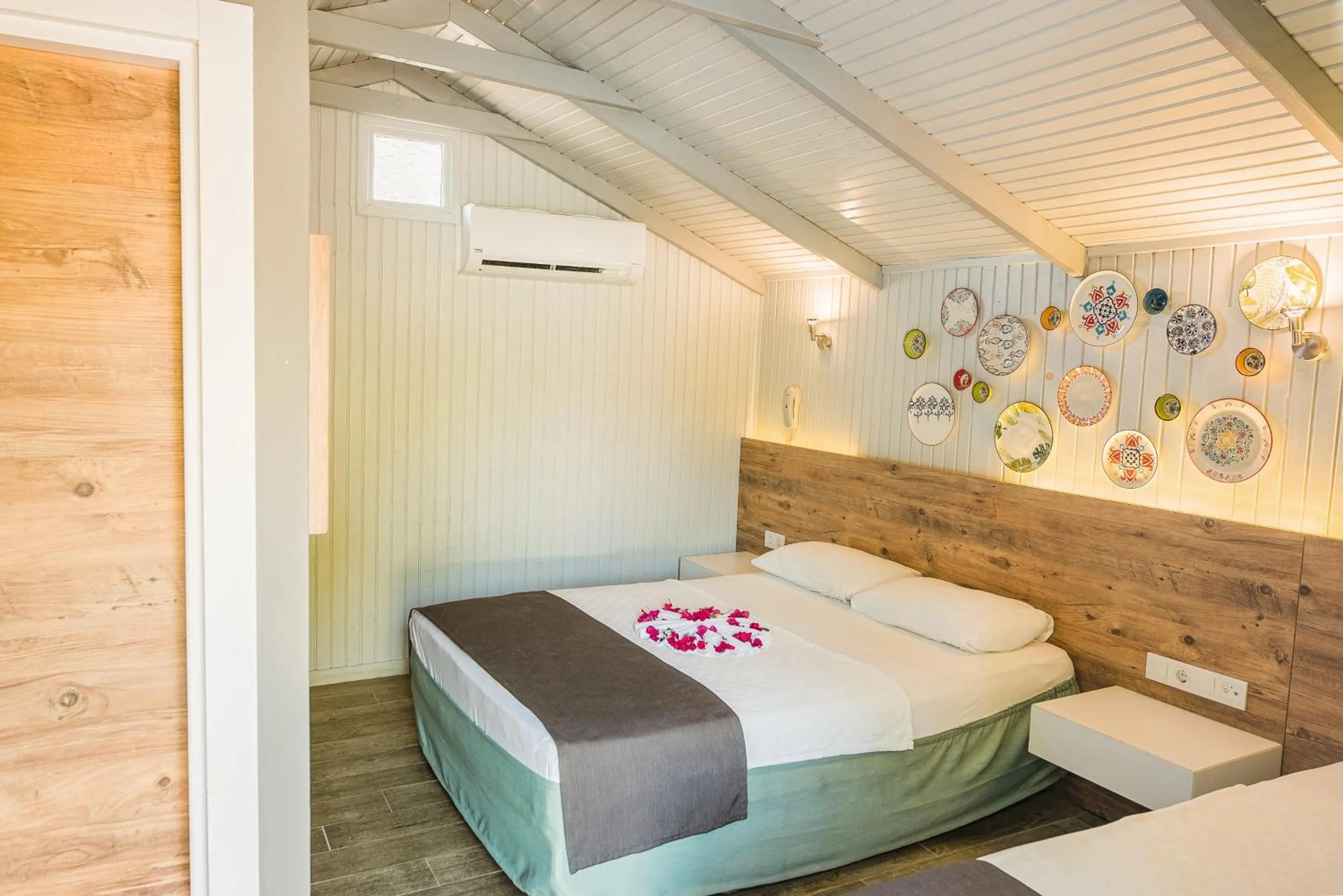 Bed in Leda Beach Hotel