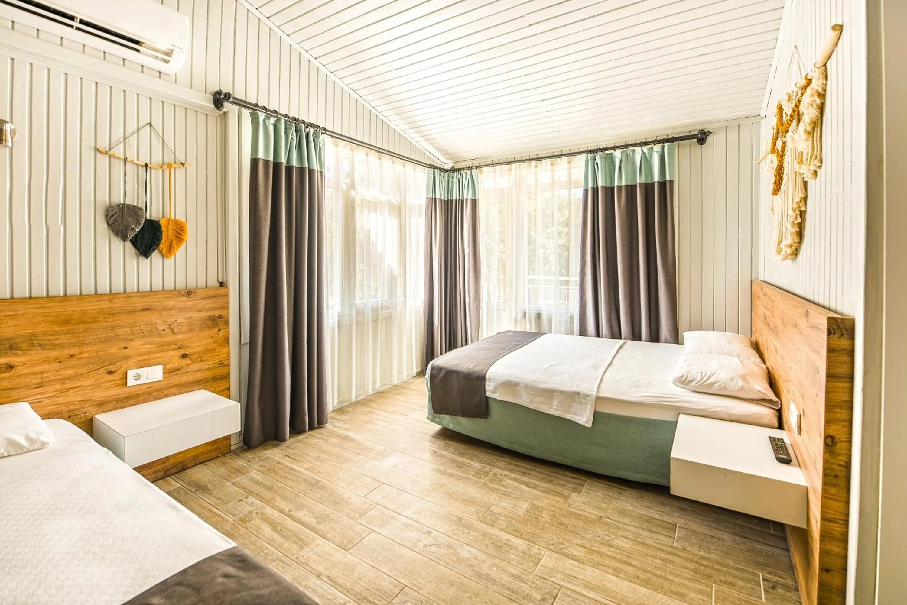 Bed in Leda Beach Hotel