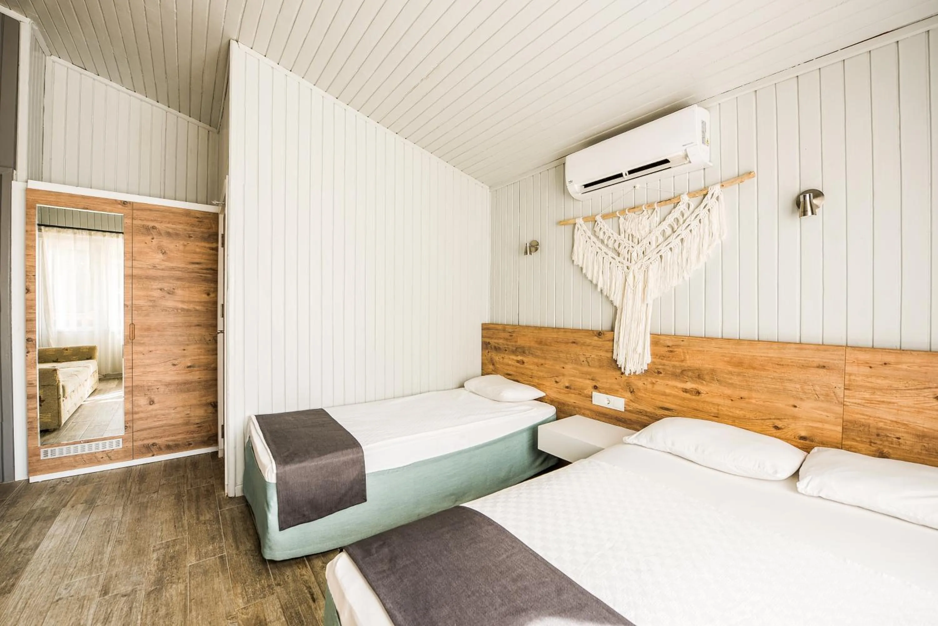 Bed in Leda Beach Hotel