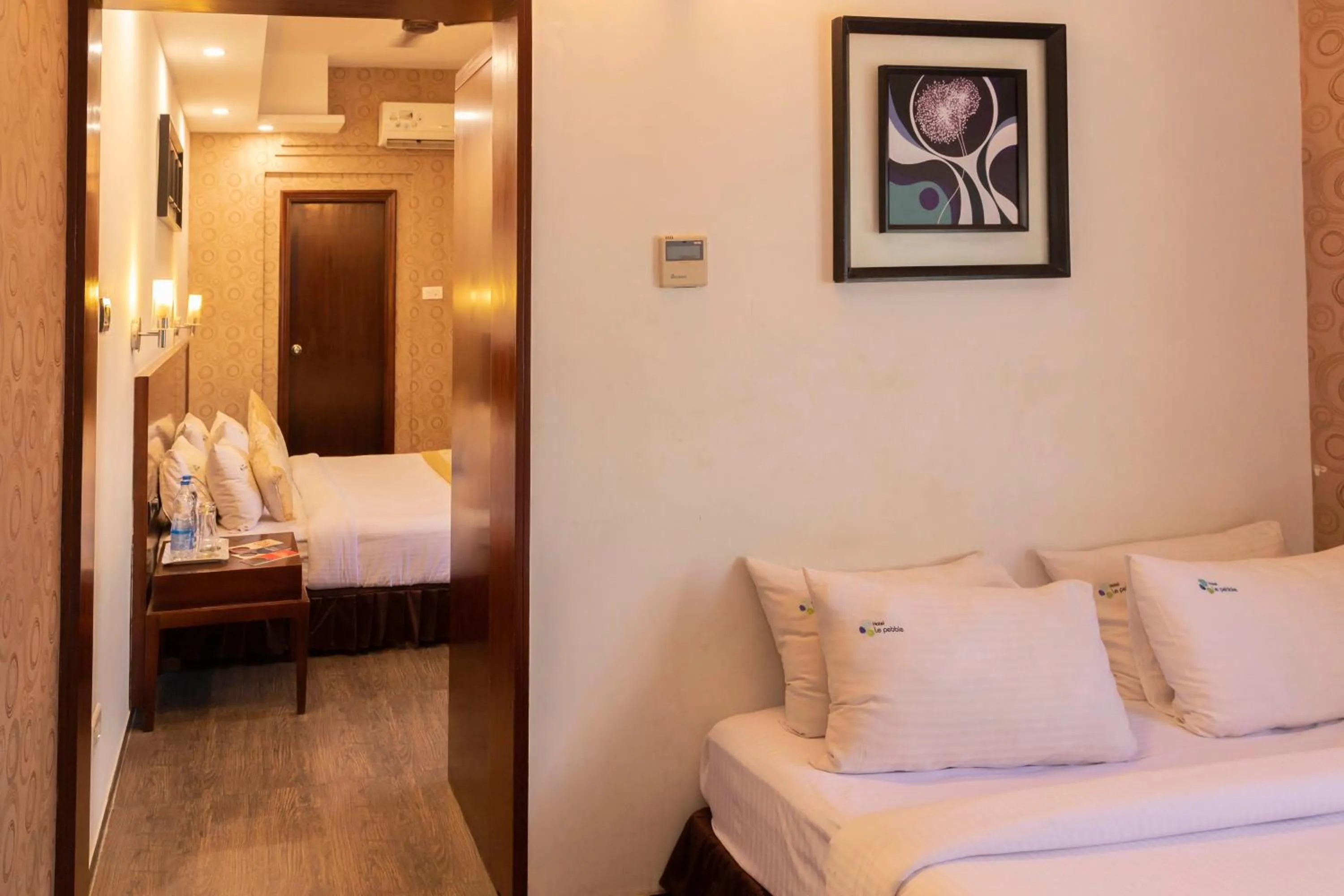 Photo of the whole room, Bed in THE PEBBLE Boutique Hotel