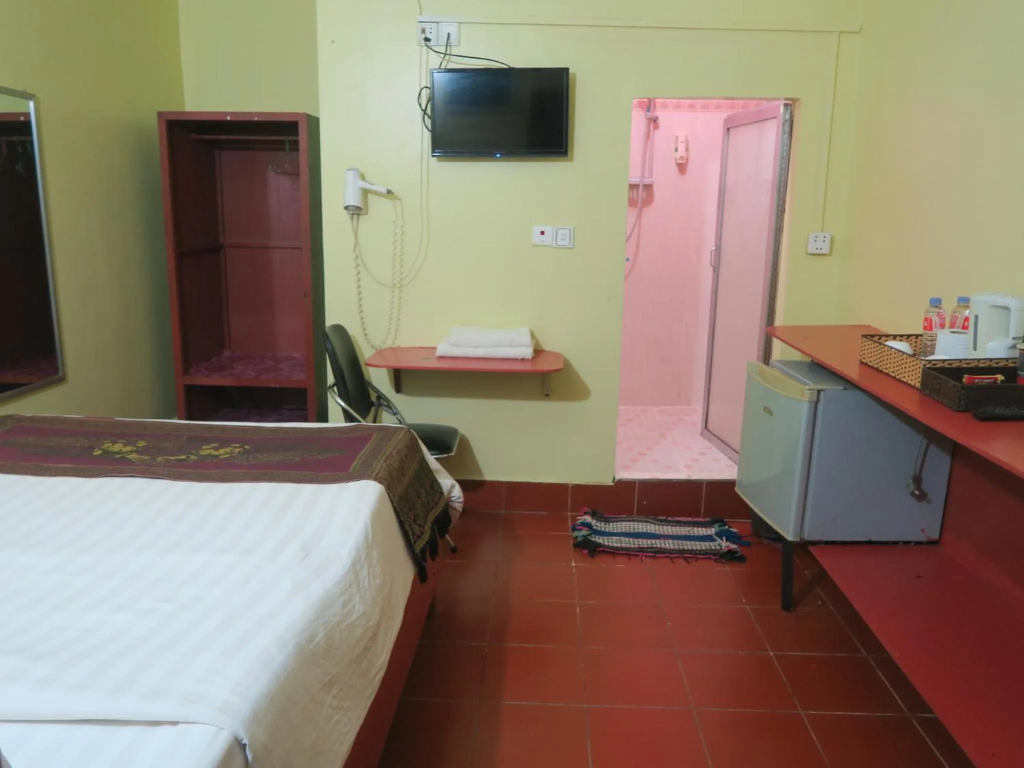 Bed in River Dolphin Hotel