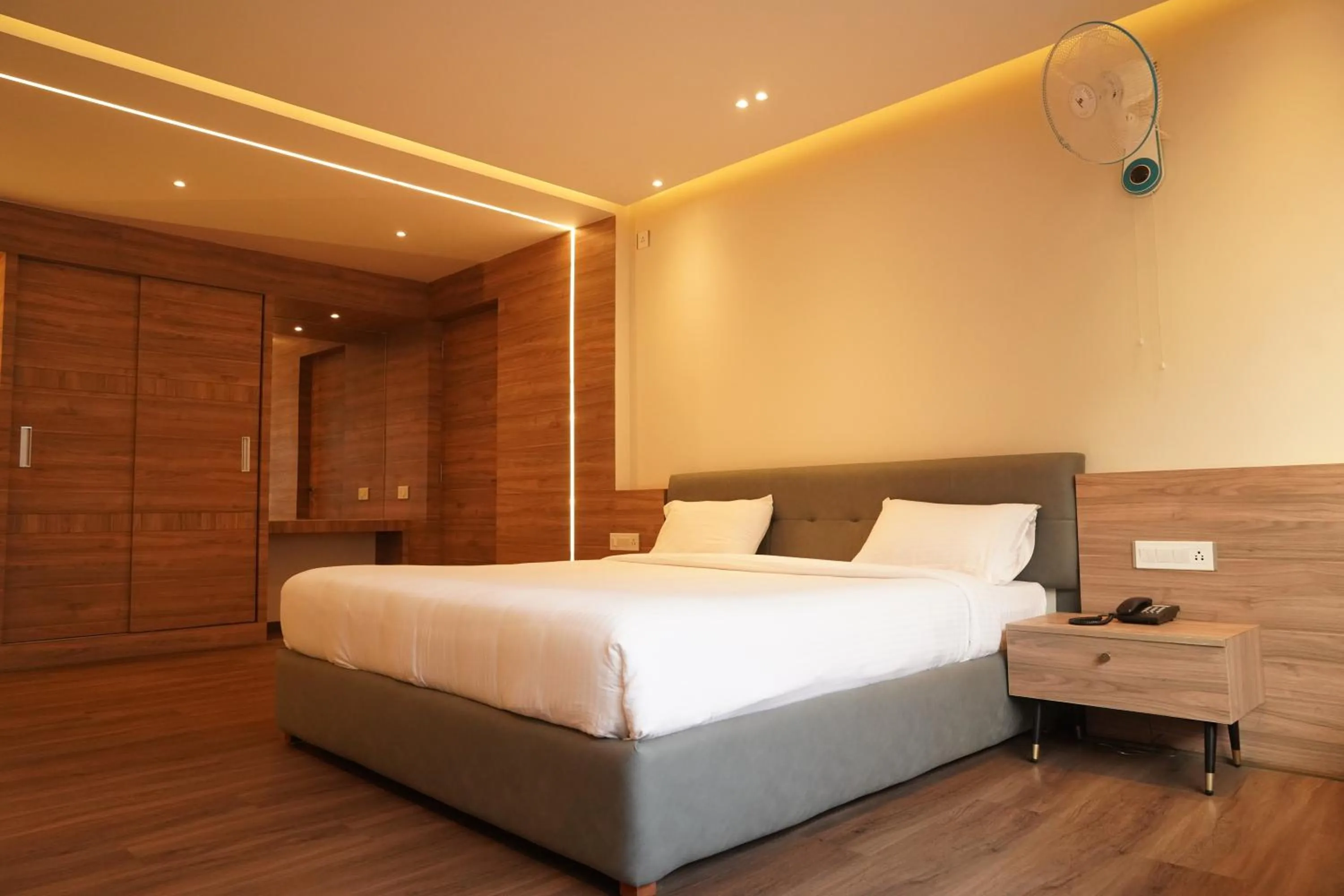 Bed in Hotel Bekal International