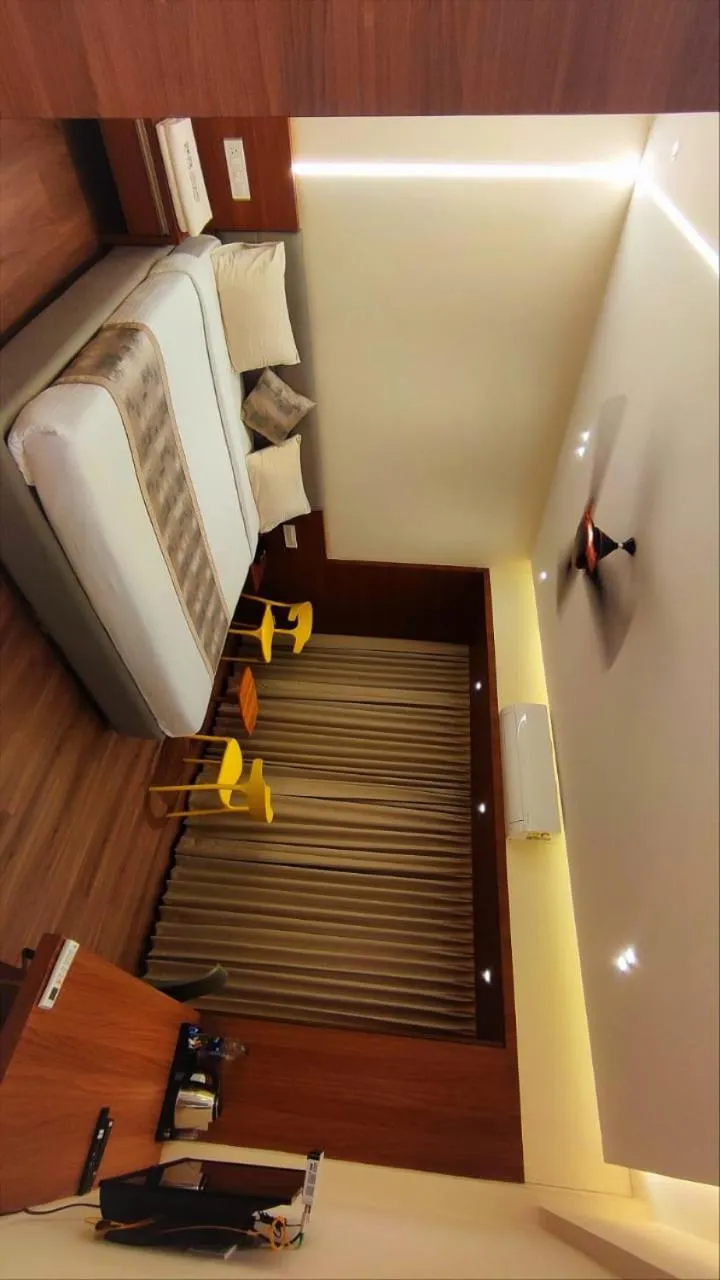 Bed in Hotel Bekal International