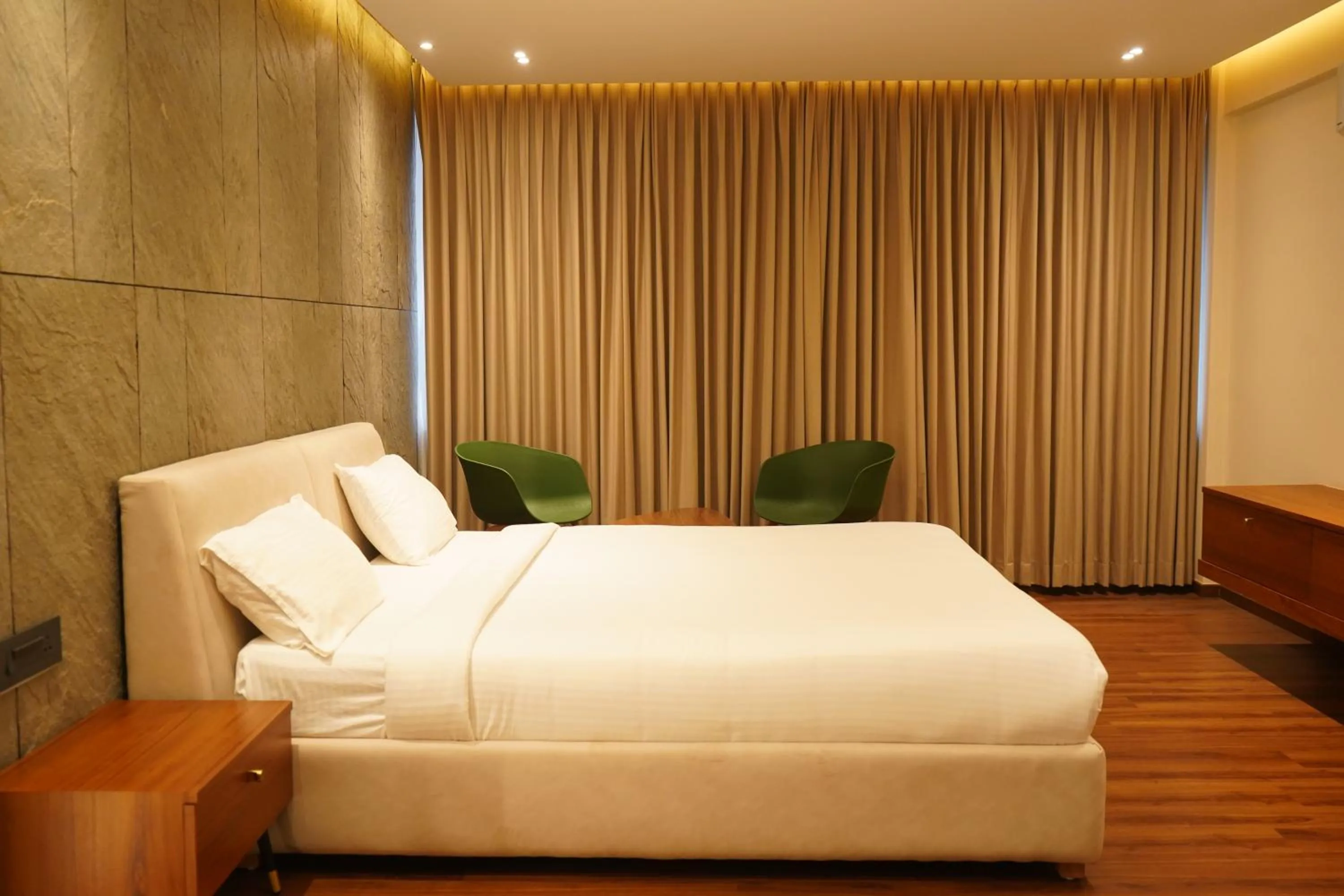 Bed in Hotel Bekal International