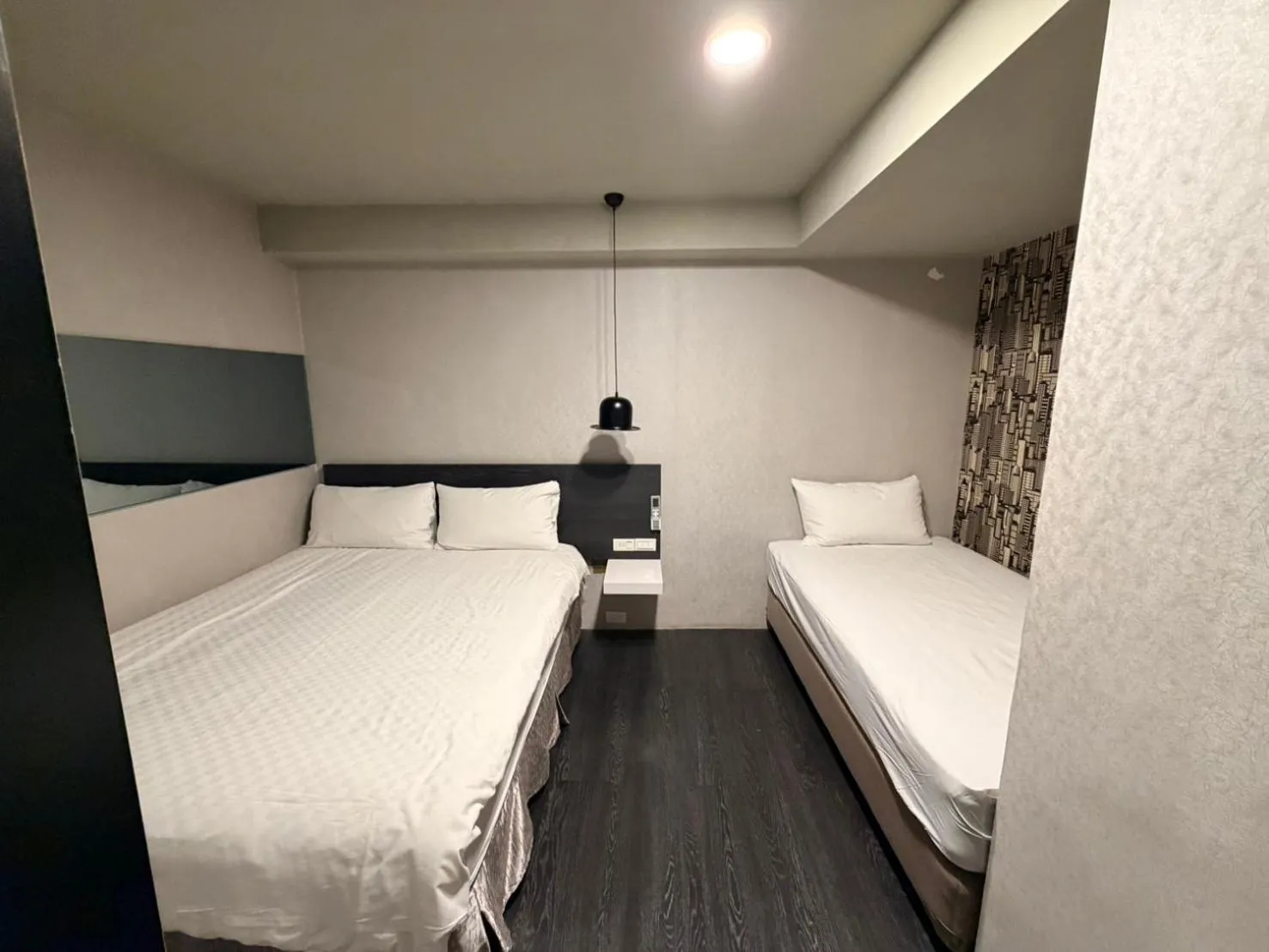 Bed in Main Inn Taipei