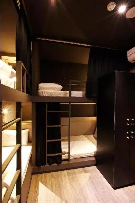 Bed in Main Inn Taipei