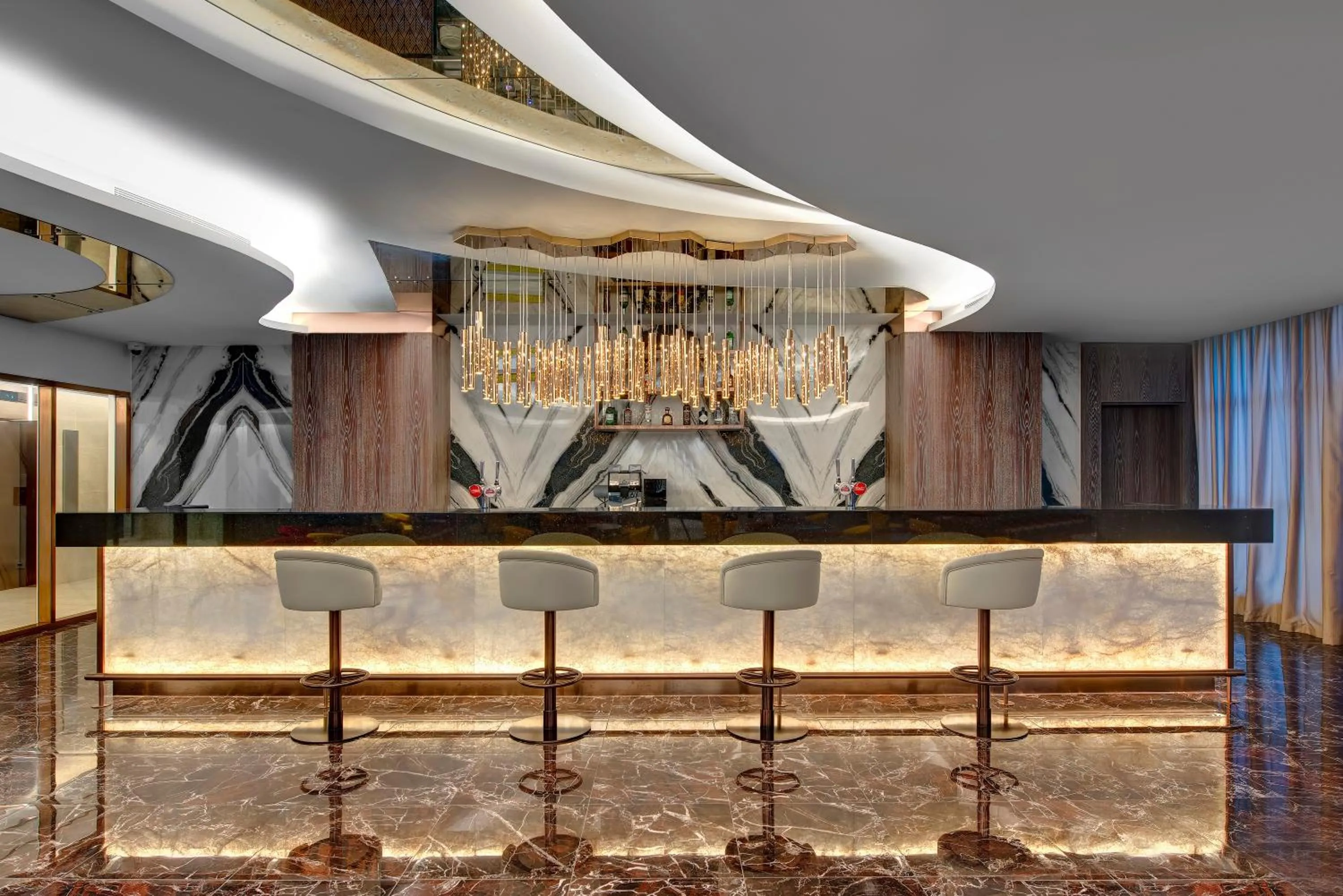 Lounge or bar in Royal M Al Aqah Beach Resort by Gewan