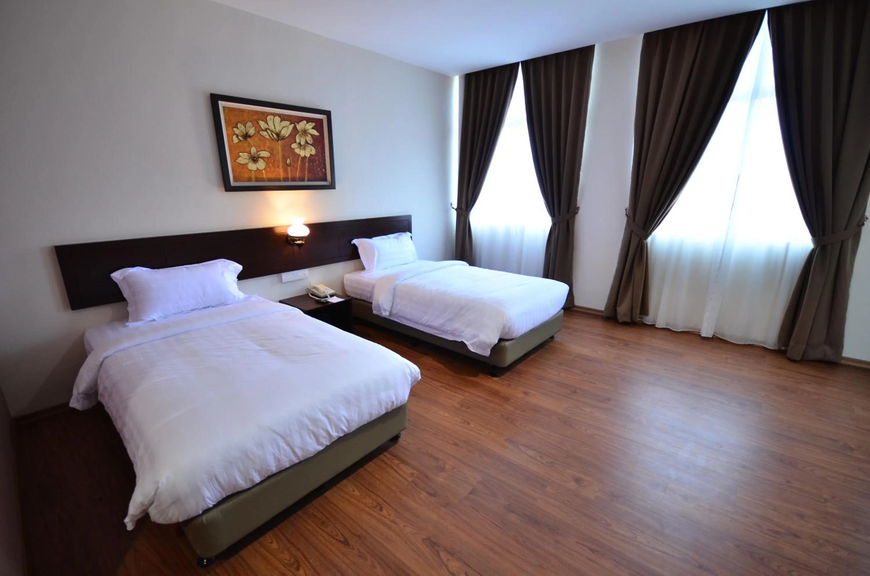 Bed in 906 Riverside Hotel Malacca