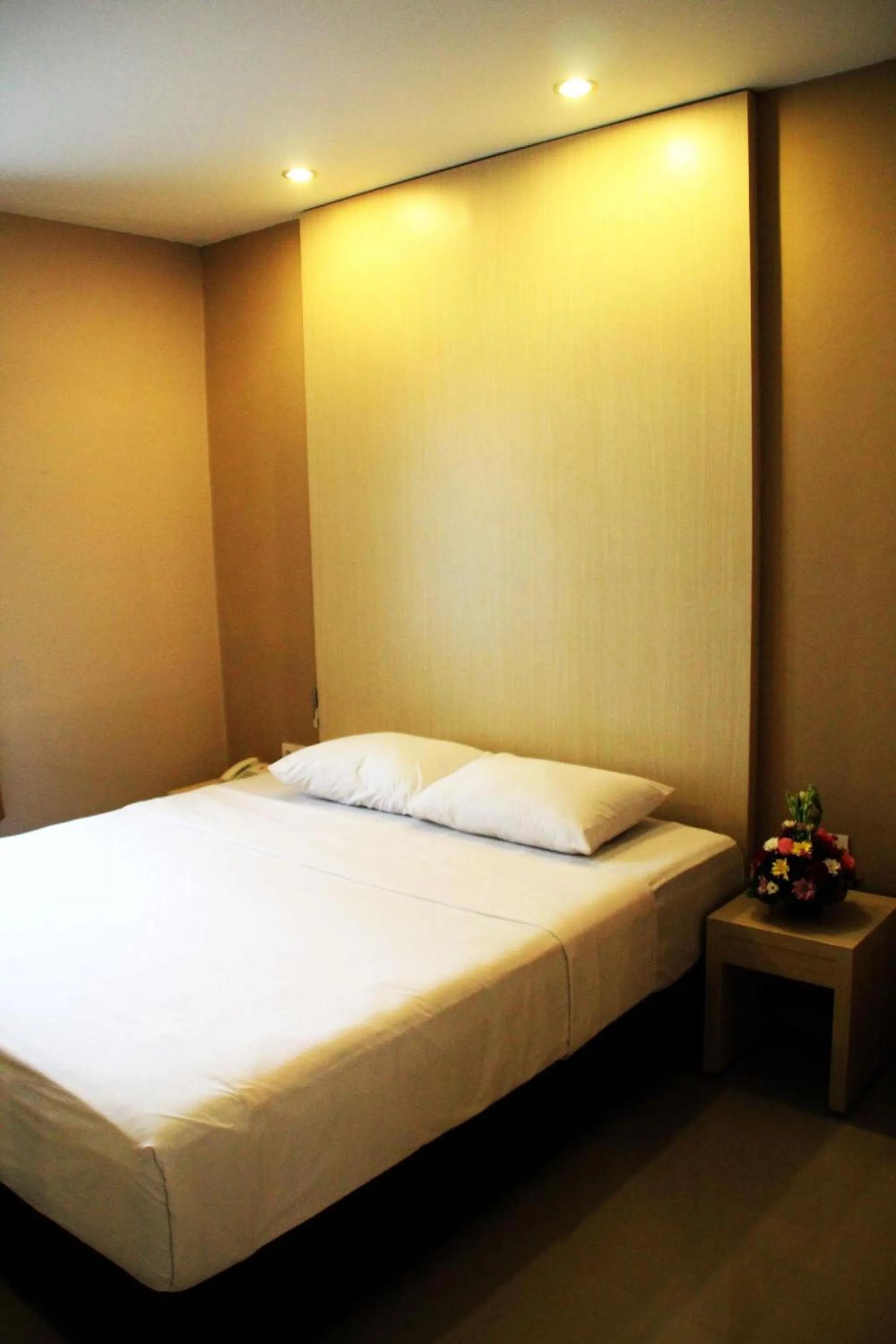 Photo of the whole room, Bed in Collection O Near Bajra Sandi Monumen Formerly Grand Pondok Puri Ayu
