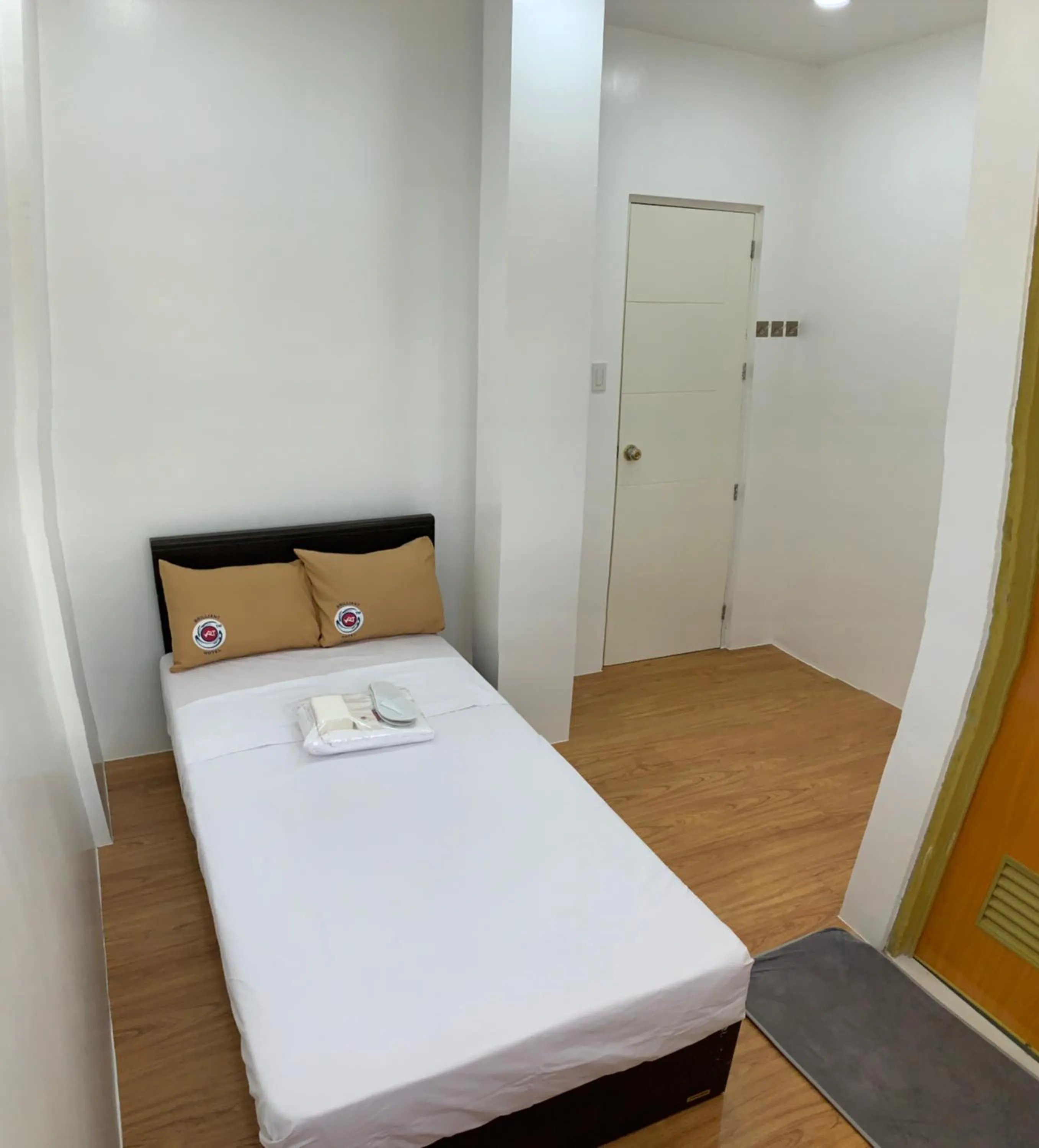 Bed in VRT Brilliant Hotel