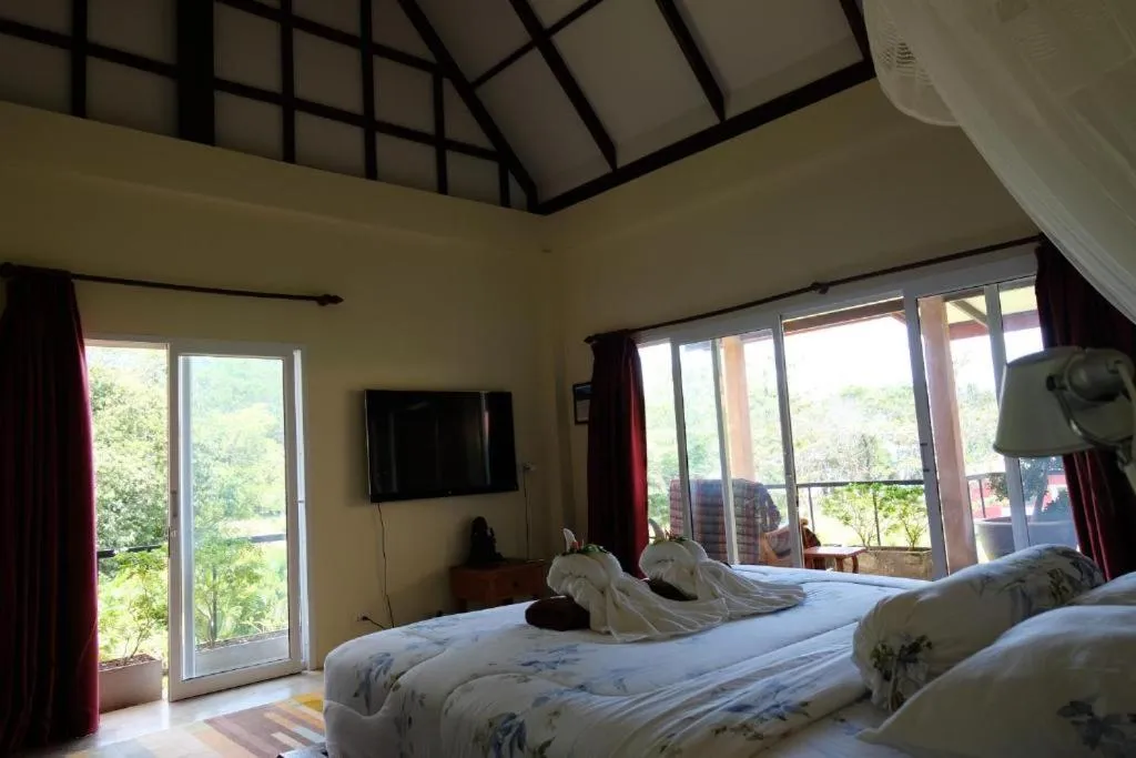 Photo of the whole room, Bed in Piman Pu